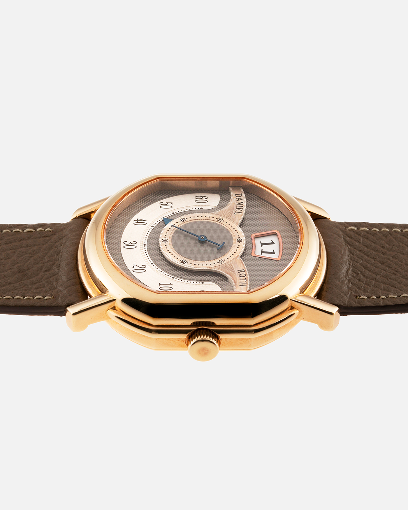 Brand: Daniel Roth Year: 1999 Model: 10th Anniversary Papillon Material: 18k Rose Gold Movement: Daniel Roth Calibre DR113 Case Diameter: 35mm X 41mm X 11mm Bracelet/Strap: Nostime Taupe Textured Calf Strap with 18k Rose Gold Tang Buckle