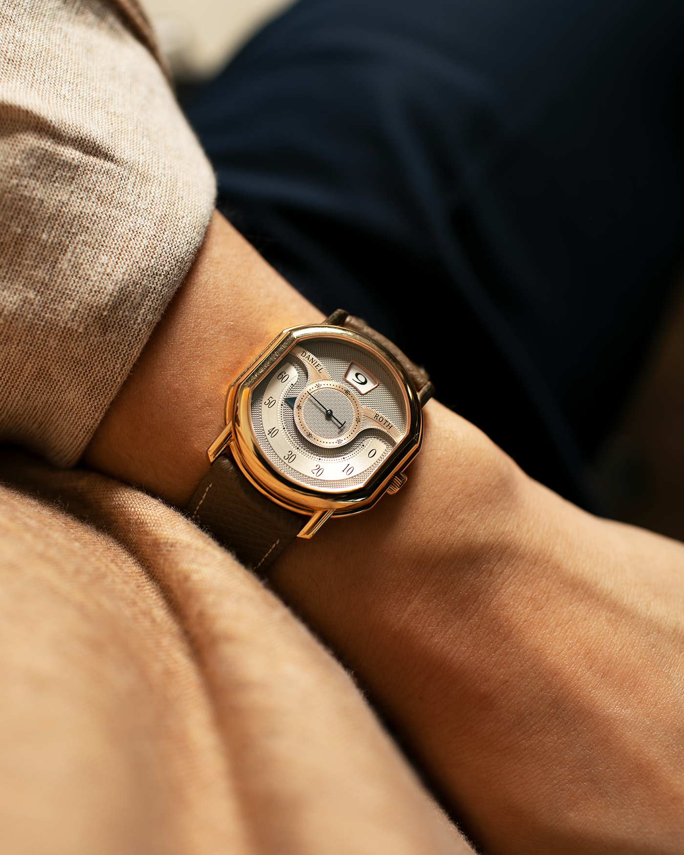 Brand: Daniel Roth Year: 1999 Model: 10th Anniversary Papillon Material: 18k Rose Gold Movement: Daniel Roth Calibre DR113 Case Diameter: 35mm X 41mm X 11mm Bracelet/Strap: Nostime Taupe Textured Calf Strap with 18k Rose Gold Tang Buckle