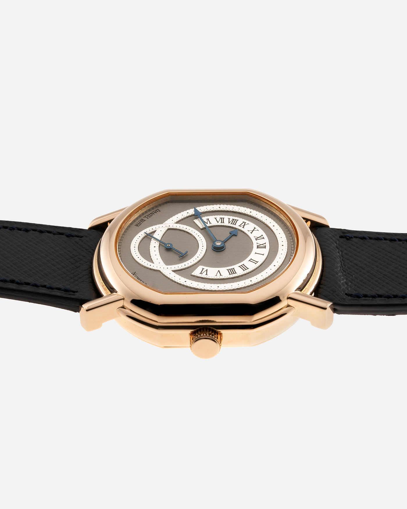 Brand: Daniel Roth Year: 1990’s Model: C127 Material: 18k Yellow Gold Movement: Lemania 27LN with Retrograde Function Case Diameter: 35mm X 38mm Strap: Molequin Navy Blue Textured Calf Strap and 18k Yellow Gold Daniel Roth Tang Buckle