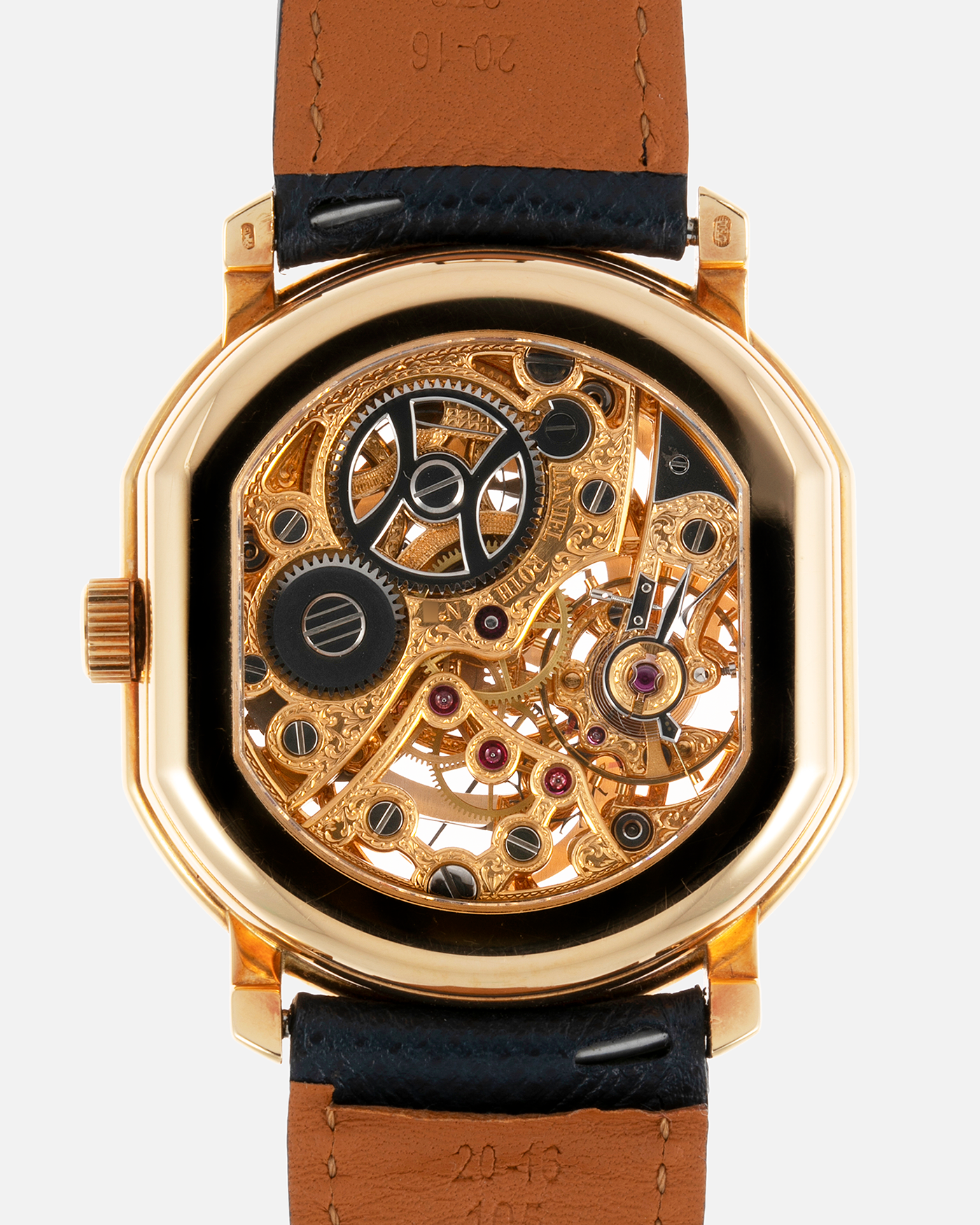 Brand: Daniel Roth Year: 1990’s Model: 2127 Skeleton Material: 18k Yellow Gold Movement: Lemania 27LN with Retrograde Function Case Diameter: 35mm X 38mm Strap: Molequin Navy Blue Textured Calf Strap and 18k Yellow Gold Daniel Roth Tang Buckle