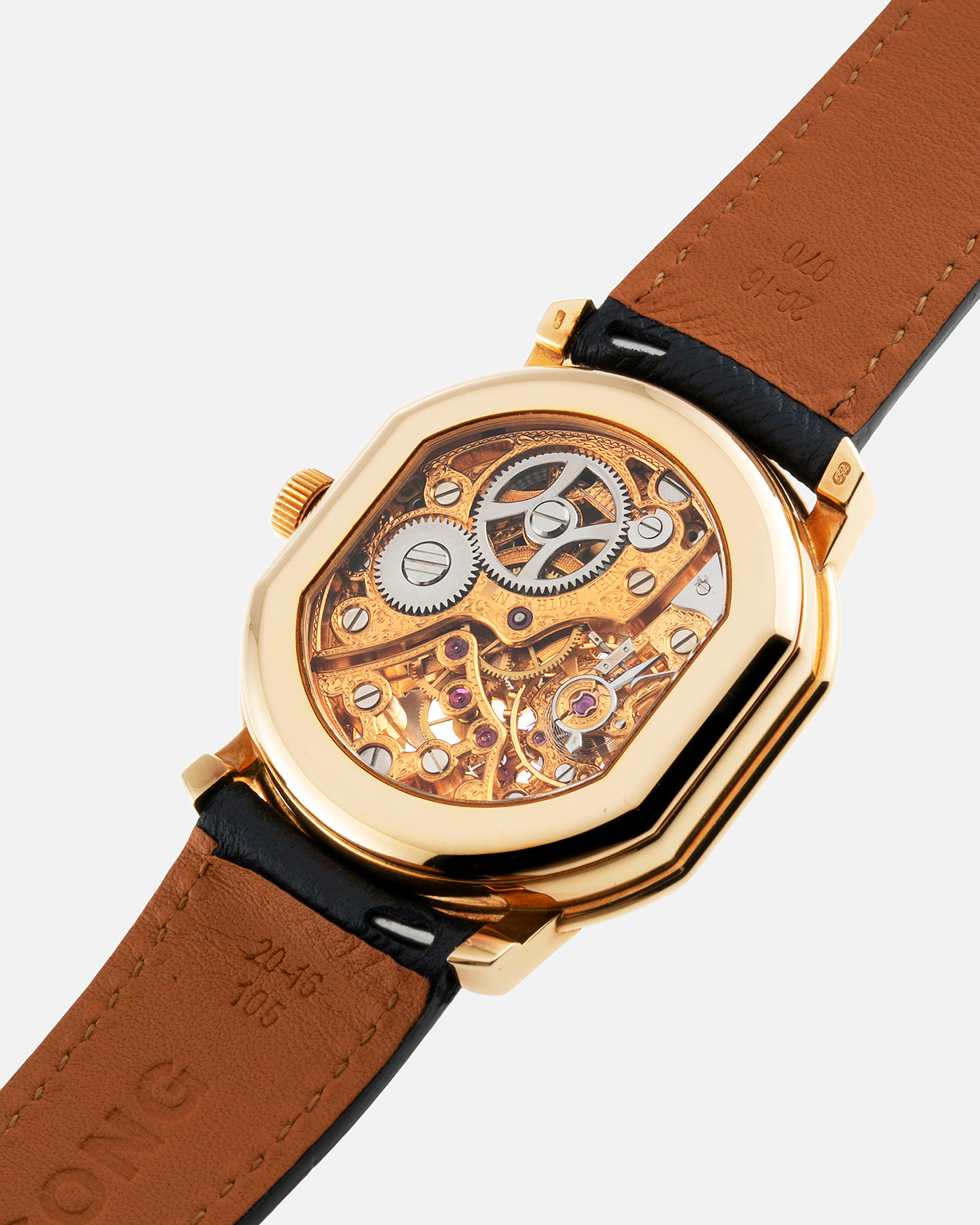 Brand: Daniel Roth Year: 1990’s Model: 2127 Skeleton Material: 18k Yellow Gold Movement: Lemania 27LN with Retrograde Function Case Diameter: 35mm X 38mm Strap: Molequin Navy Blue Textured Calf Strap and 18k Yellow Gold Daniel Roth Tang Buckle