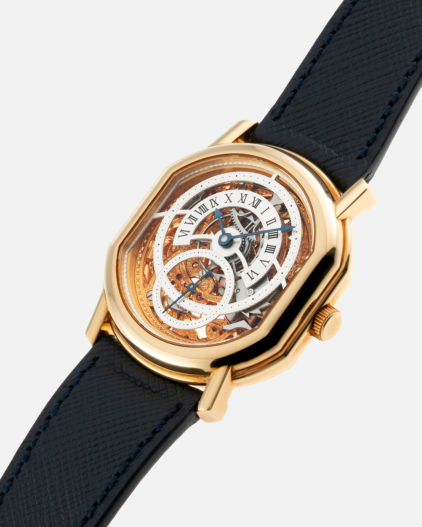 Brand: Daniel Roth Year: 1990’s Model: 2127 Skeleton Material: 18k Yellow Gold Movement: Lemania 27LN with Retrograde Function Case Diameter: 35mm X 38mm Strap: Molequin Navy Blue Textured Calf Strap and 18k Yellow Gold Daniel Roth Tang Buckle