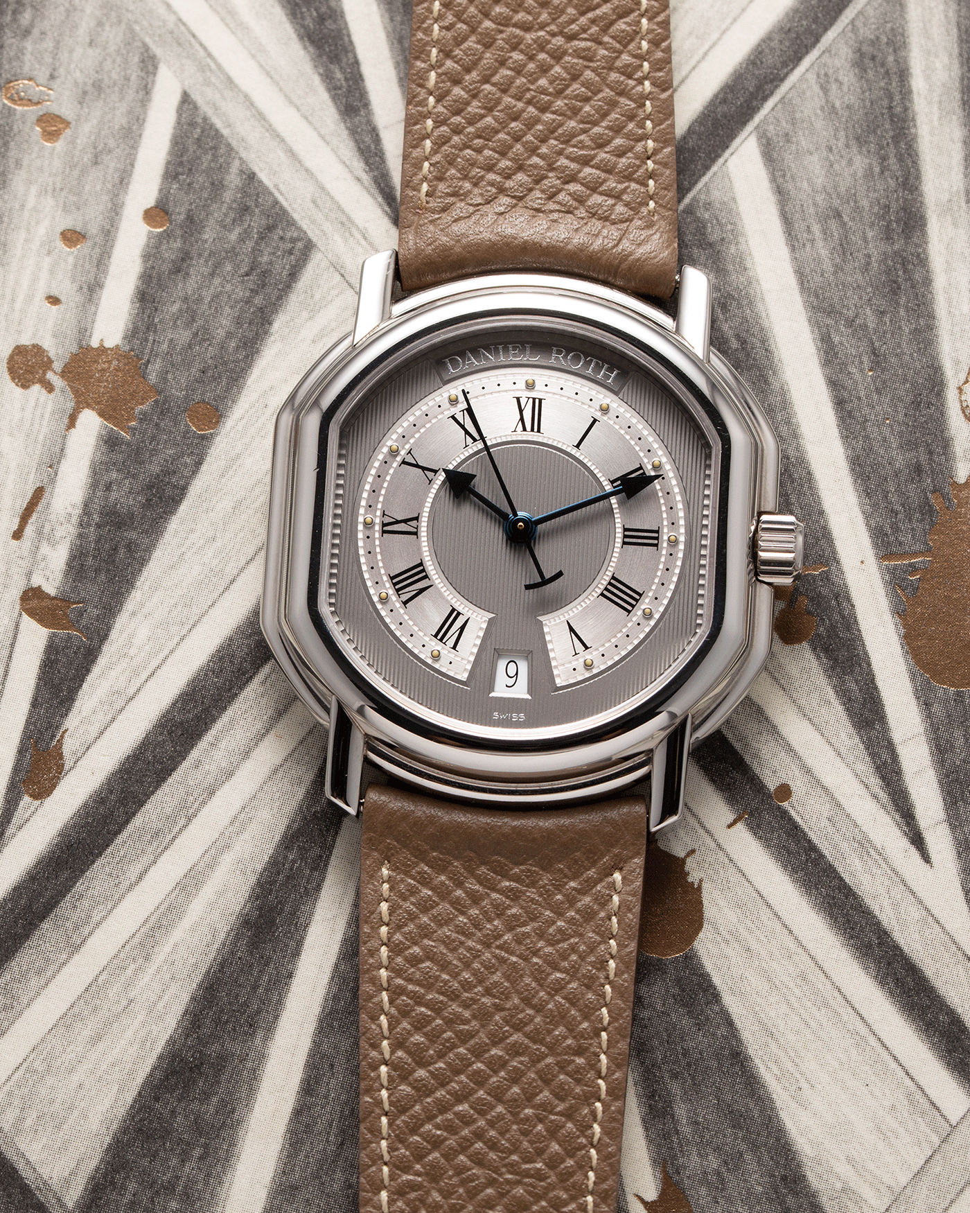 Brand: Daniel Roth Year: 1990’s Model: S177 Material: Stainless Steel Case Diameter: 35mmX38mm Bracelet/Strap: Nostime Taupe Grained Calf with Generic Stainless Steel Tang Buckle