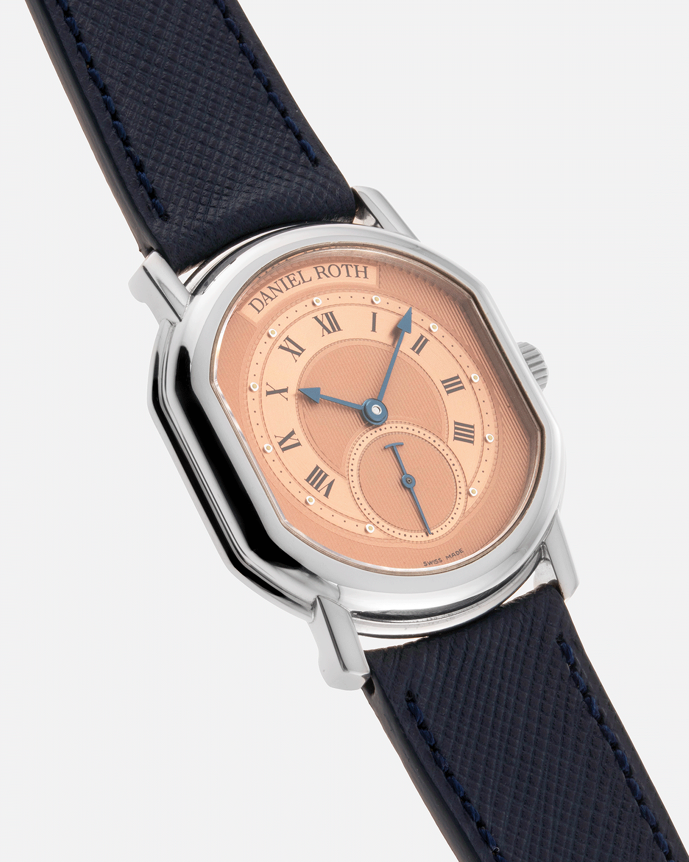 Brand: Daniel Roth Year: 1990’s Model: Small Seconds Material: Stainless Steel Case Diameter: 35mmX38mm Bracelet/Strap: Navy Blue Molequin Textured Calf and Stainless Steel Daniel Roth Tang Buckle