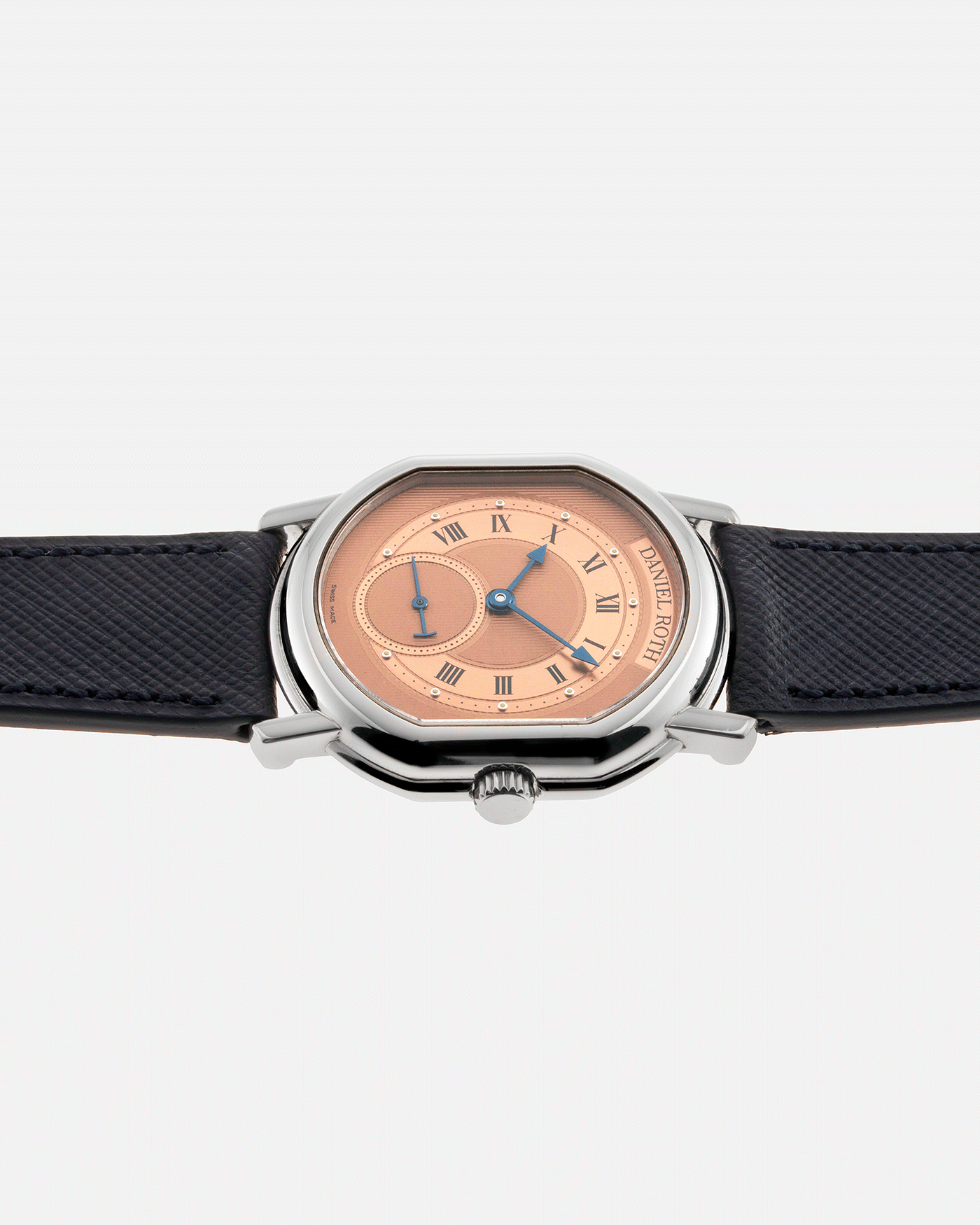 Brand: Daniel Roth Year: 1990’s Model: Small Seconds Material: Stainless Steel Case Diameter: 35mmX38mm Bracelet/Strap: Navy Blue Molequin Textured Calf and Stainless Steel Daniel Roth Tang Buckle
