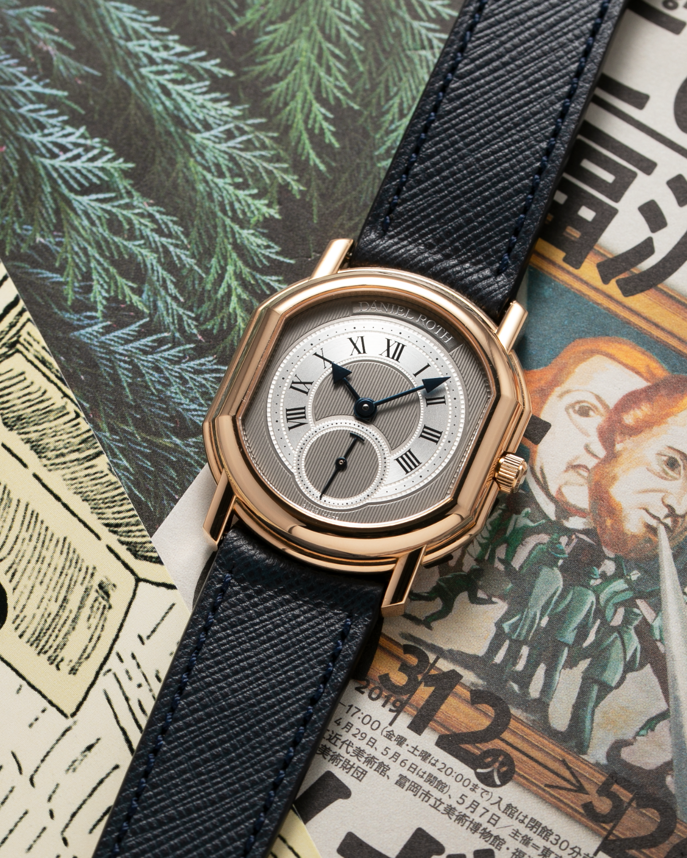 Brand: Daniel Roth Year: 1990’s Model: Seconds at Six Material: 18k Yellow Gold  Movement: Girard Perregaux 3100 Case Diameter: 35mmX32mm Bracelet/Strap: Molequin Navy Calf with 18k Yellow Gold Daniel Roth Tang Buckle