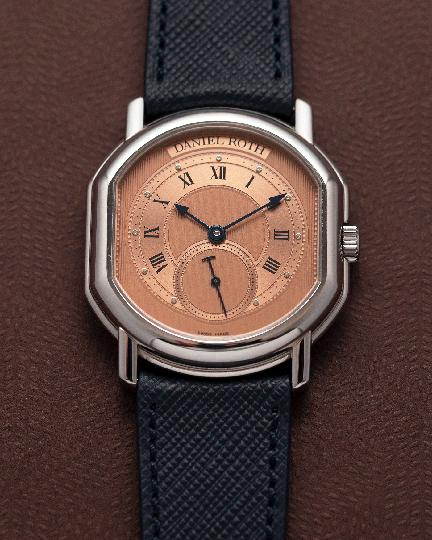 Brand: Daniel Roth Year: 1990’s Model: Small Seconds Material: Stainless Steel Case Diameter: 35mmX38mm Bracelet/Strap: Navy Blue Molequin Textured Calf and Stainless Steel Daniel Roth Tang Buckle