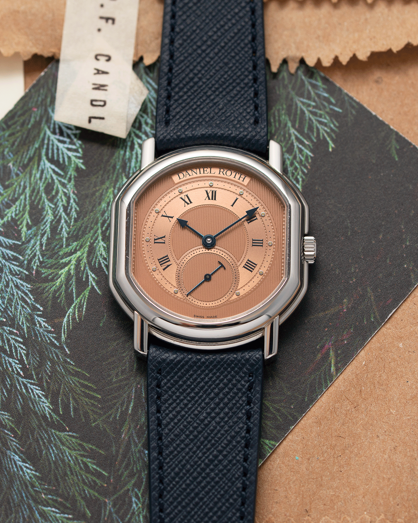 Brand: Daniel Roth Year: 1990’s Model: Small Seconds Material: Stainless Steel Case Diameter: 35mmX38mm Bracelet/Strap: Navy Blue Molequin Textured Calf and Stainless Steel Daniel Roth Tang Buckle