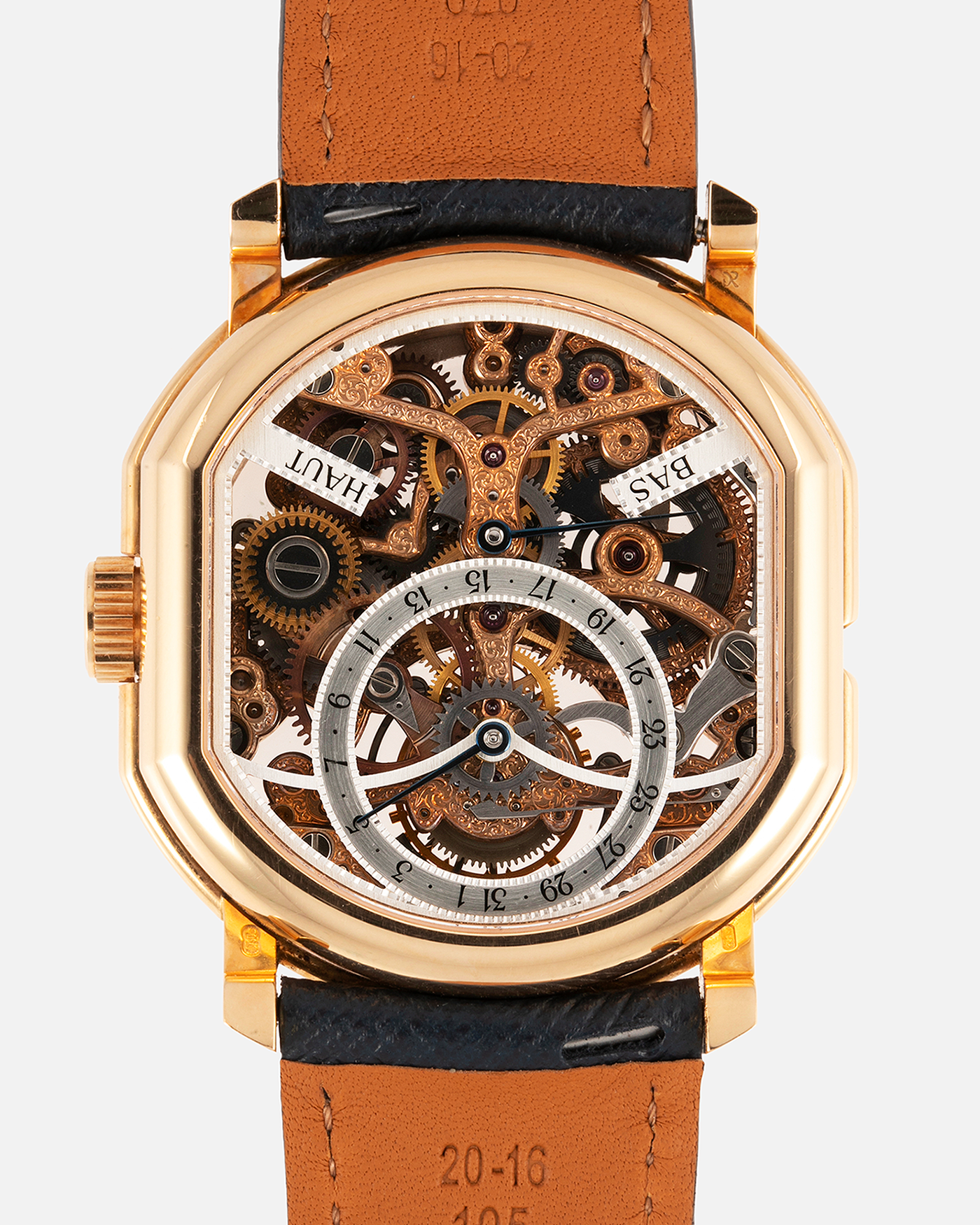 Brand: Daniel Roth Year: 1990’s Model: 2187 Material: 18k Yellow Gold Movement: Cal. DR 307 One-Minute Tourbillon Regulator Case Diameter: 35mm X 38mm Strap: Molequin Navy Blue Textured Calf and18k Yellow Gold Tang Buckle