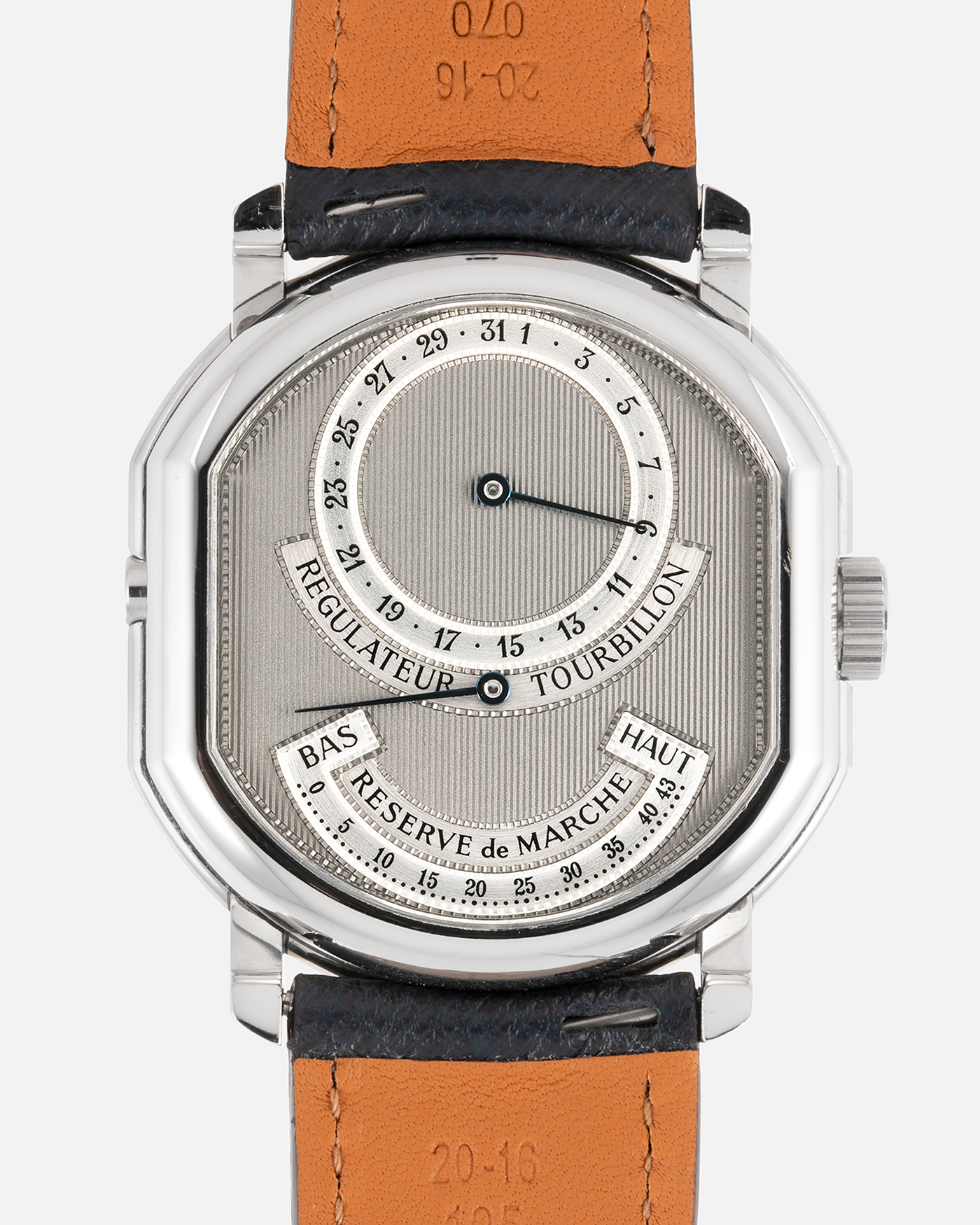 Brand: Daniel Roth Year: 1990’s Model: 2187 Material: Stainless Steel Movement: Cal. DR 307 One-Minute Tourbillon Regulator Case Diameter: 35mm X 38mm Strap: Molequin Navy Blue Textured Calf and Stainless Steel Deployant Clasp