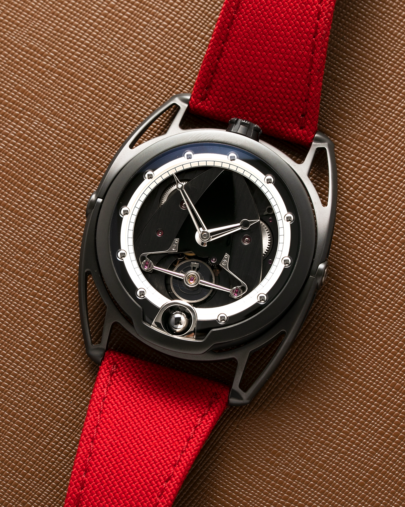 Brand: De Bethune Year: 2017 Model: Black Zirconium Reference: DB28 Material: Black Zirconium Movement: In-House Cal. DB2115V4 Case Diameter: 42.6mm Strap: De Bethune Red Fabric Strap with Black Zirconium Tang Buckle 