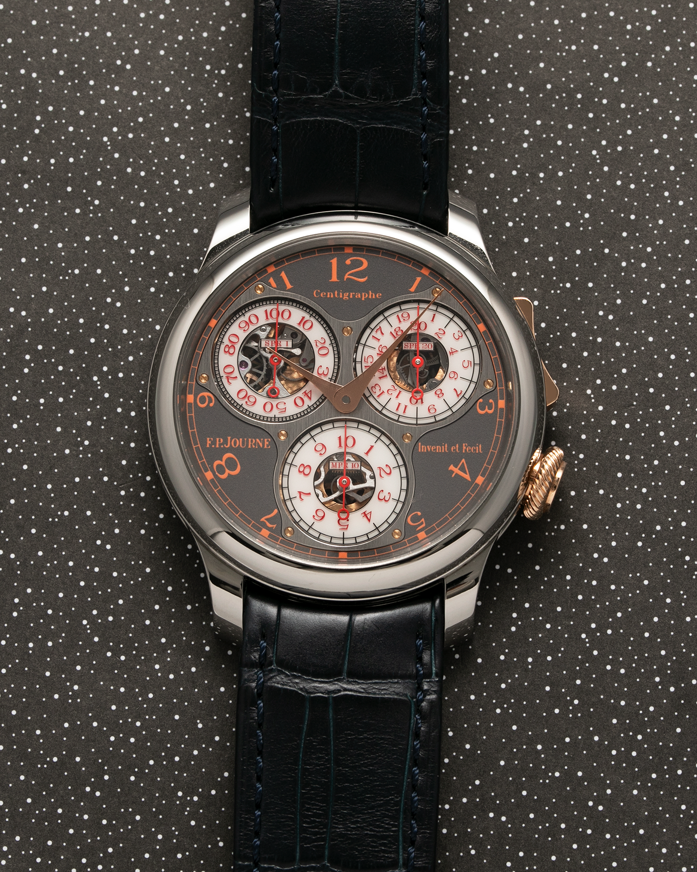 Brand: F.P. Journe Year: 2016 Model: Centigraphe Souverain Anniversaire Material: Titanium and 18k Rose Gold Movement: in-house FP Journe Caliber 1506 Case Diameter: 40mm Bracelet/Strap: F.P. Journe Dark Blue Alligator Strap with Rose Gold Deployant Clasp