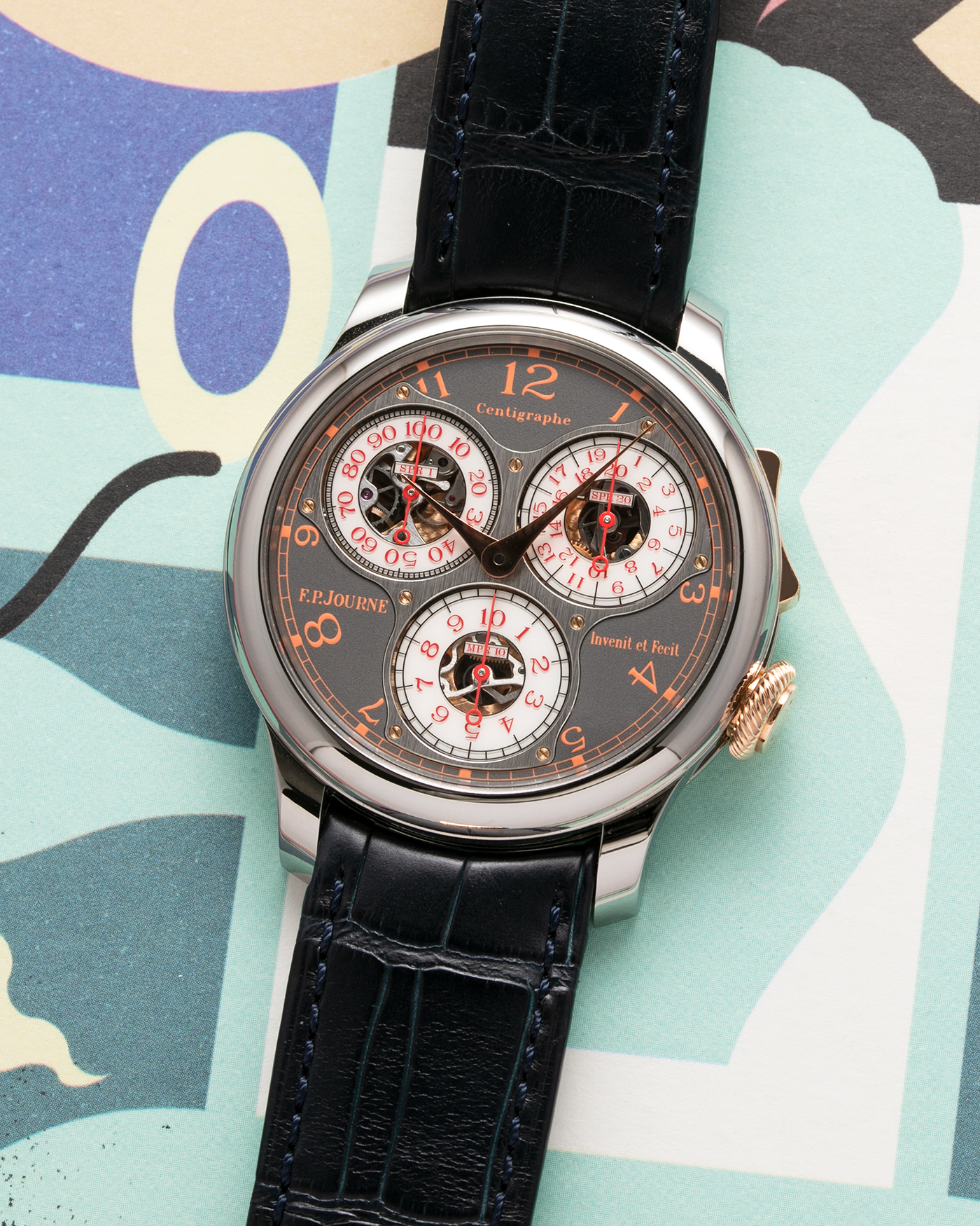 Brand: F.P. Journe Year: 2016 Model: Centigraphe Souverain Anniversaire Material: Titanium and 18k Rose Gold Movement: in-house FP Journe Caliber 1506 Case Diameter: 40mm Bracelet/Strap: F.P. Journe Dark Blue Alligator Strap with Rose Gold Deployant Clasp