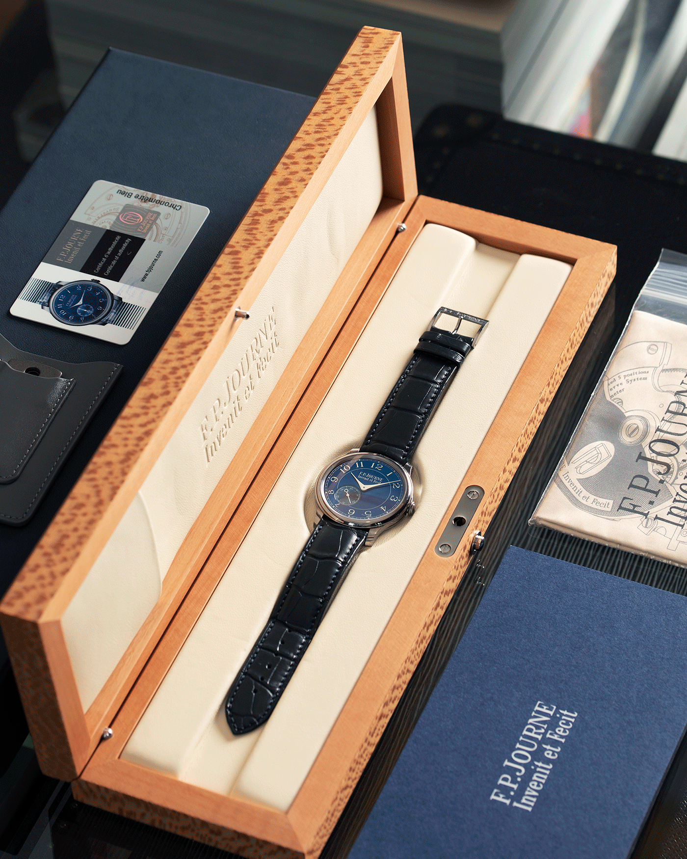 Brand: F.P. Journe Year: 2016 Model: Chronometre Bleu Material: Tantalum Movement: in-house FPJ calibre 1304 Case Diameter: 39mm Bracelet/Strap: F.P. Journe Blue Alligator and Tantalum Tang Buckle