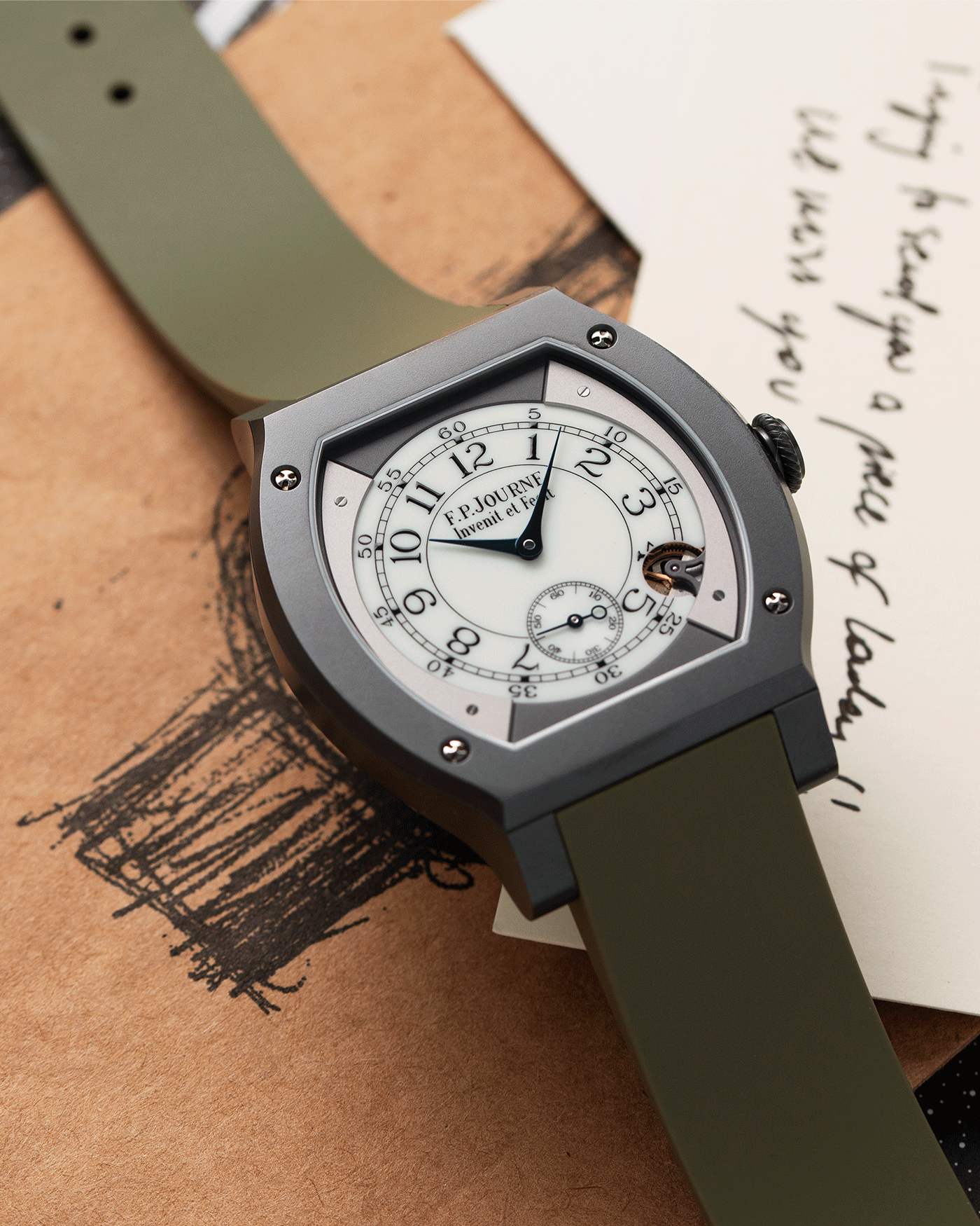  Brand: F.P. Journe Year: 2020 Model: Elegante 48  Material: Grade 5 Titanium with ‘Titalyt’ Treatment Movement: FPJ calibre 1210 Case Diameter: 48mm X 40mm Bracelet/Strap: F.P. Journe Green Rubber Strap and Additional Orange Rubber Strap