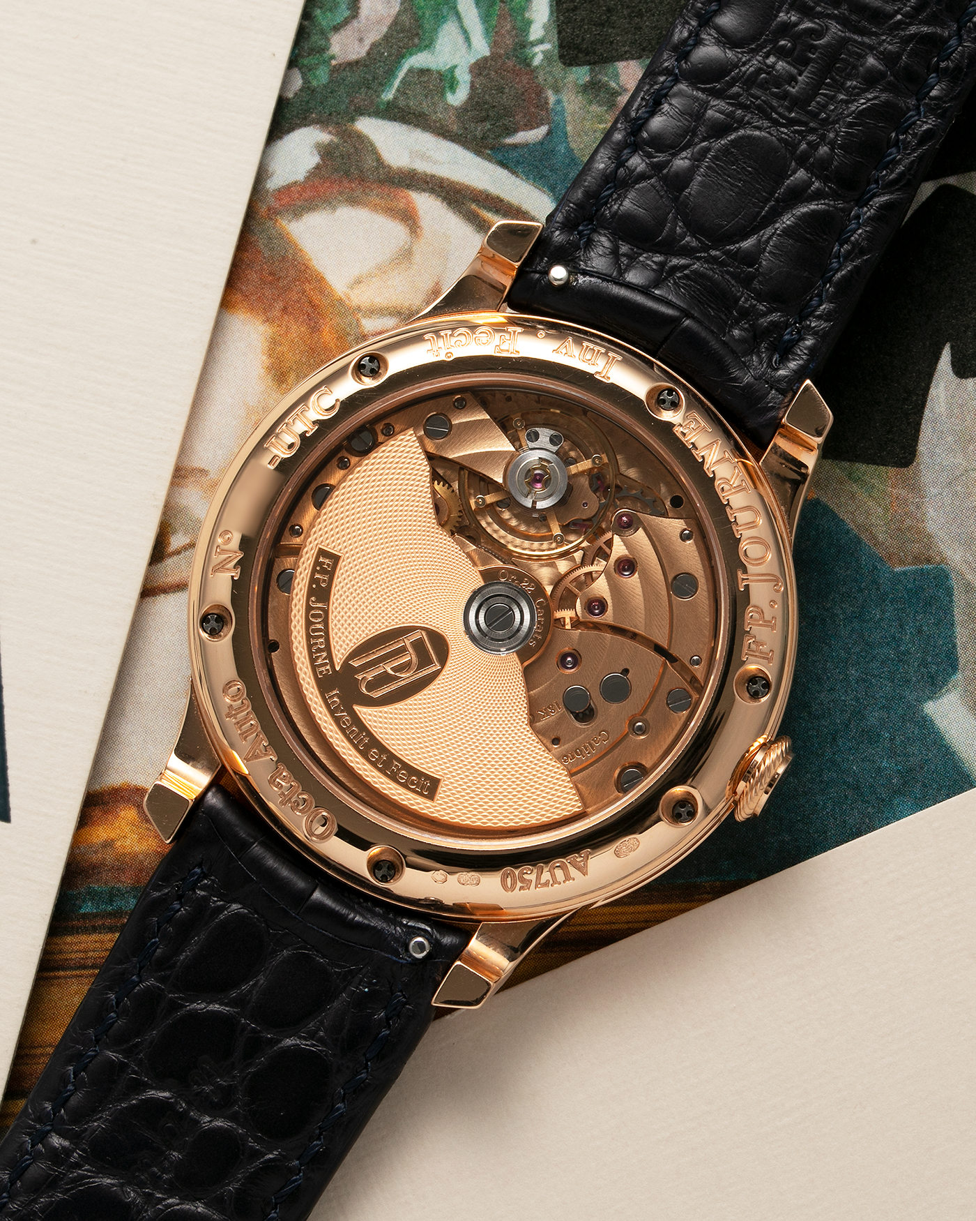 Brand: F. P. Journe. Year: 2020 Model: Octa UTC Material: 18-carat Rose Gold Movement: FPJ Cal. 1300-3 in 18-carat Rose Gold, Self-Winding Case Diameter: 40mm Bracelet / Strap: F. P. Journe Navy Black Alligator and 18-carat Rose Gold Signed Tang Buckle with additional F. P. Journe Aegean Blue Alligator Leather Strap, and Cobalt Blue Alligator Leather Strap. 