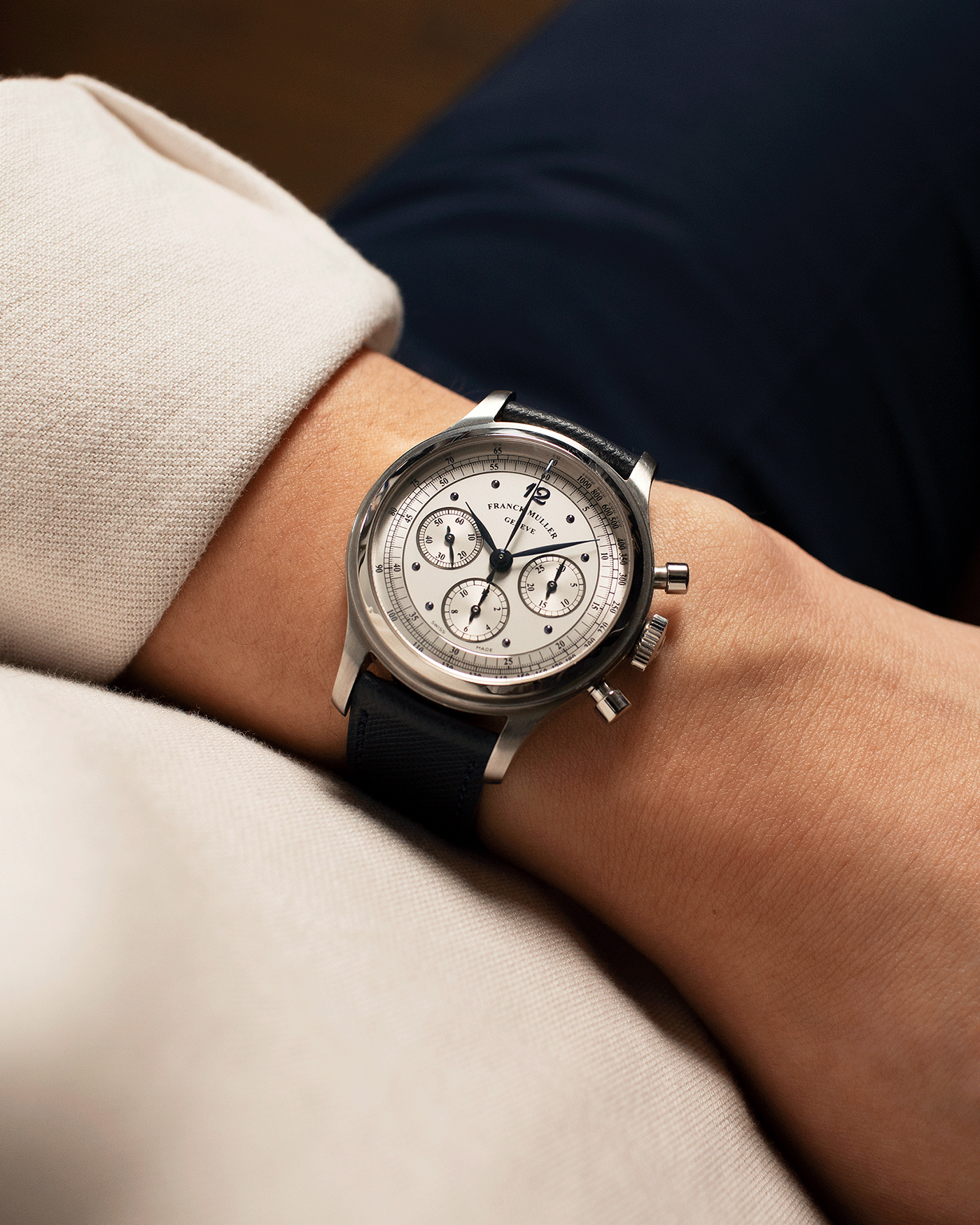 Brand: Franck Muller Year: 1990’s Model: Sport Limited Edition Chronograph Mercedes Benz Material: Stainless Steel Movement: Modified Lemania Cal. 1874 Case Diameter: 37mm Strap: Navy Blue Molequin Textured Calf Strap with Franck Muller Stainless Steel Tang Buckle