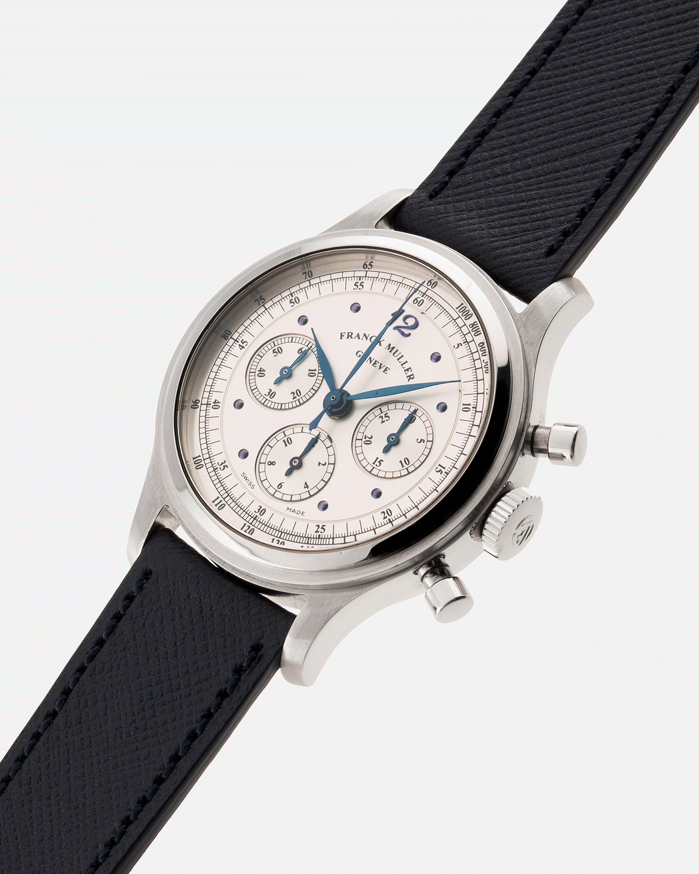 Brand: Franck Muller Year: 1990’s Model: Sport Limited Edition Chronograph Mercedes Benz Material: Stainless Steel Movement: Modified Lemania Cal. 1874 Case Diameter: 37mm Strap: Navy Blue Molequin Textured Calf Strap with Franck Muller Stainless Steel Tang Buckle