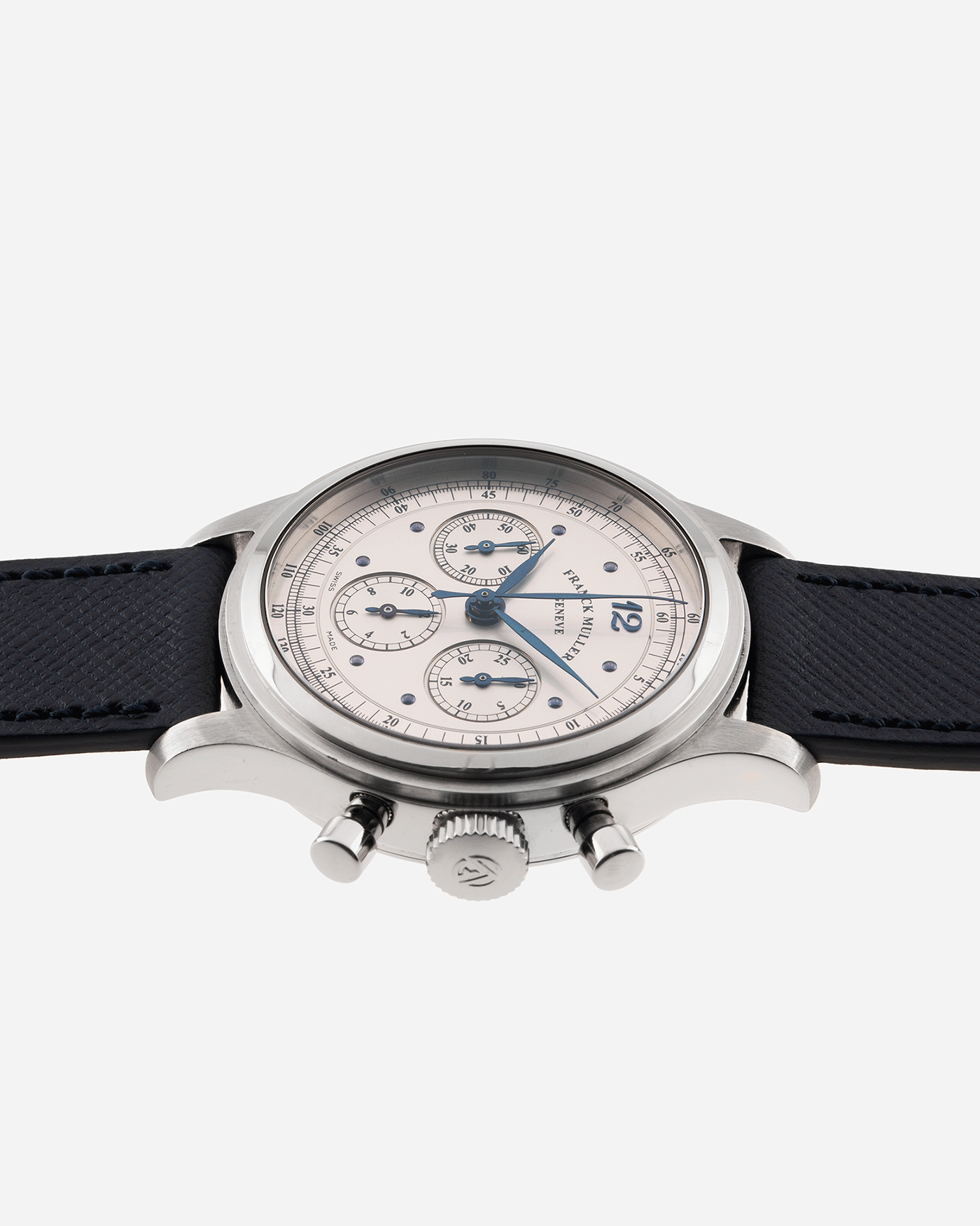 Brand: Franck Muller Year: 1990’s Model: Sport Limited Edition Chronograph Mercedes Benz Material: Stainless Steel Movement: Modified Lemania Cal. 1874 Case Diameter: 37mm Strap: Navy Blue Molequin Textured Calf Strap with Franck Muller Stainless Steel Tang Buckle
