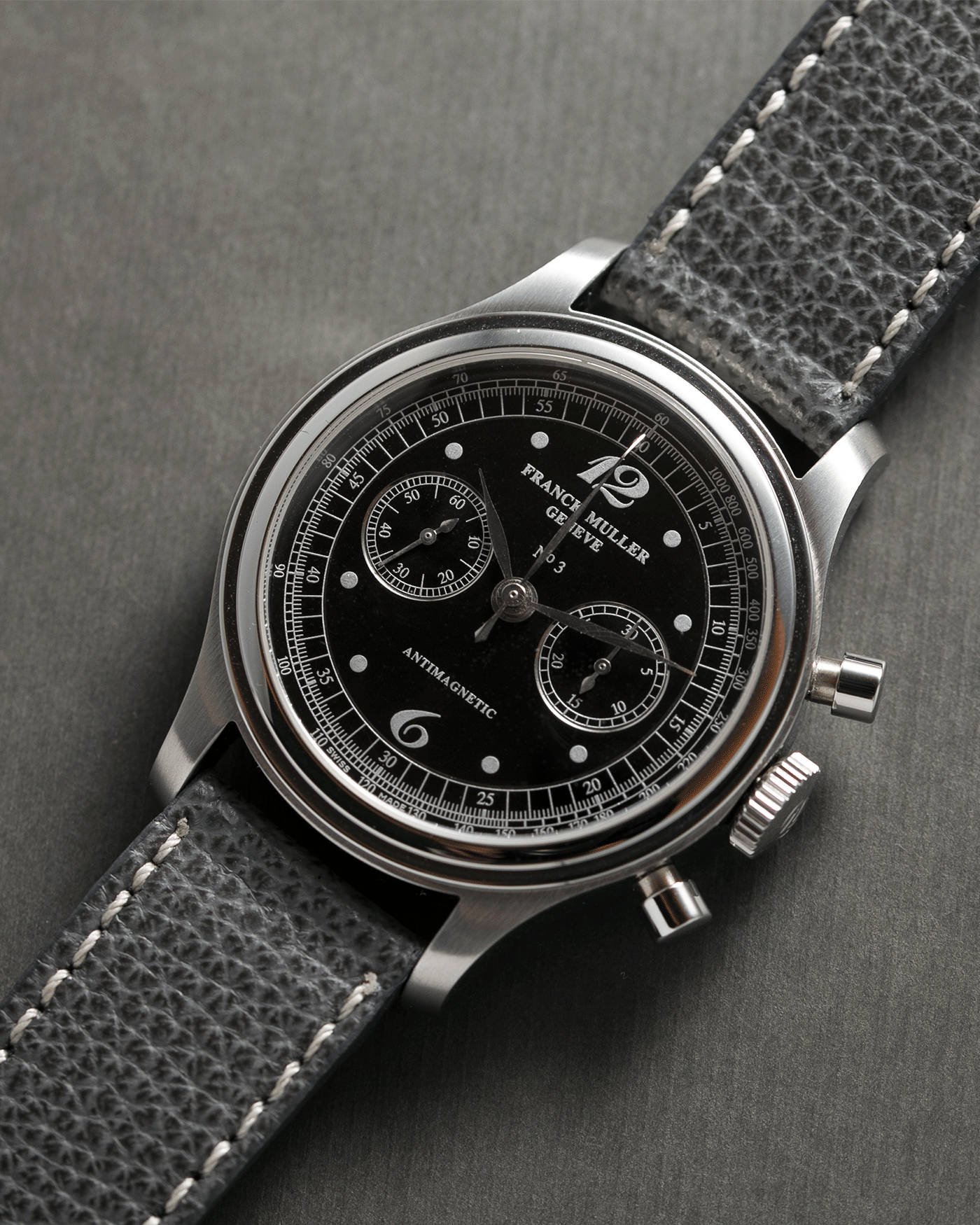 Brand: Franck Muller Year: 1990’s Model: Sport Limited Edition Chronograph Material: Stainless Steel Movement: Modified Lemania Cal. 1874 Case Diameter: 37mm Strap: Grey Analog Shift Leather Strap with Stainless Steel Buckle