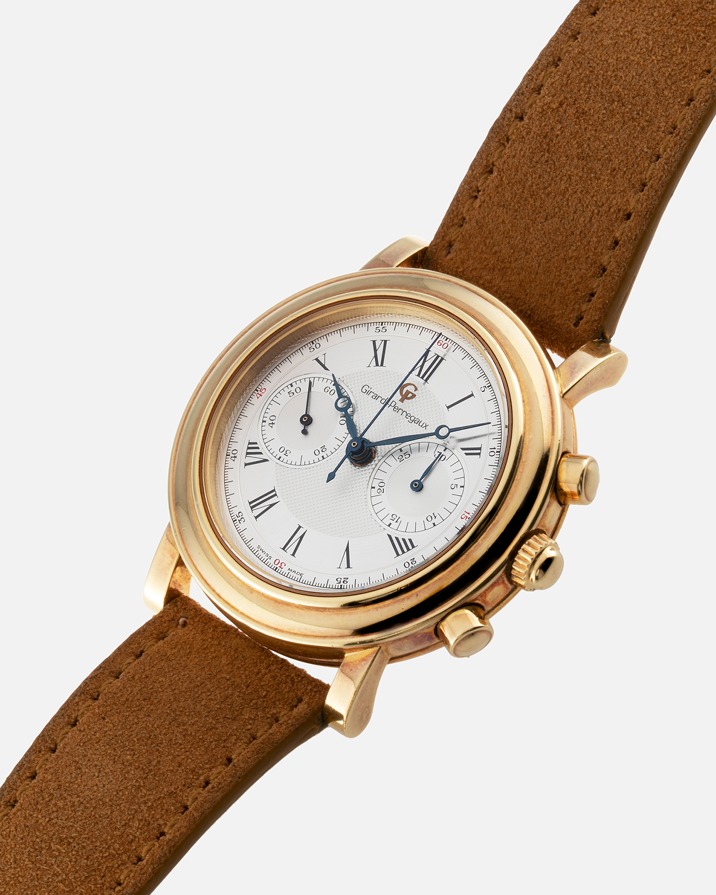 Brand: Girard Perregaux Year: 1990’s Reference Number: 47930 Material: 18k Yellow Gold Movement: Lemania Cal. 1872  Case Diameter: 38mm Strap: Tan Strap and 18k Yellow Gold Girard Perregaux Tan Buckle