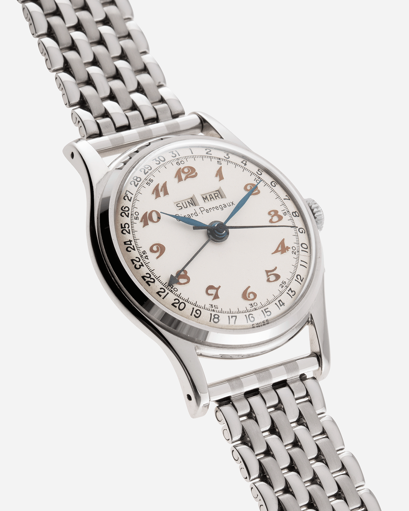Brand: Girard Perregaux Year: 1950’s Model: Triple Calendar Reference Number: 5368 Material: Stainless Steel Movement: Girard Perregaux 39 212 Case Diameter: 34mm Lug Width: 18mm Bracelet/Strap: Stainless Steel Beads of Rice Bracelet