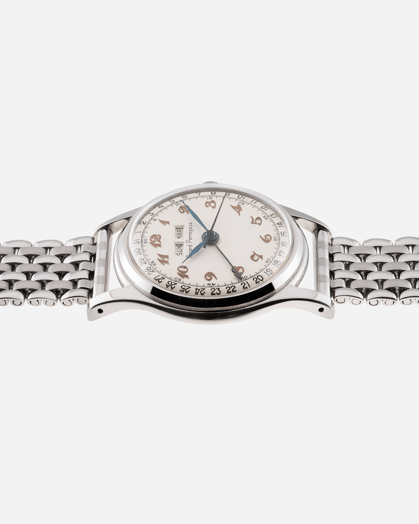 Brand: Girard Perregaux Year: 1950’s Model: Triple Calendar Reference Number: 5368 Material: Stainless Steel Movement: Girard Perregaux 39 212 Case Diameter: 34mm Lug Width: 18mm Bracelet/Strap: Stainless Steel Beads of Rice Bracelet