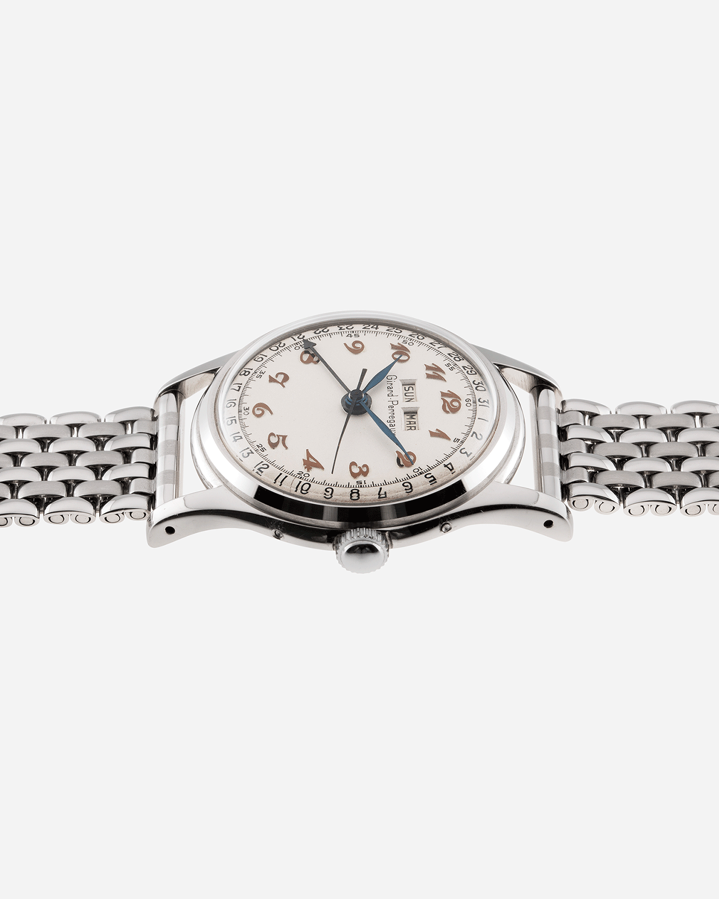 Brand: Girard Perregaux Year: 1950’s Model: Triple Calendar Reference Number: 5368 Material: Stainless Steel Movement: Girard Perregaux 39 212 Case Diameter: 34mm Lug Width: 18mm Bracelet/Strap: Stainless Steel Beads of Rice Bracelet