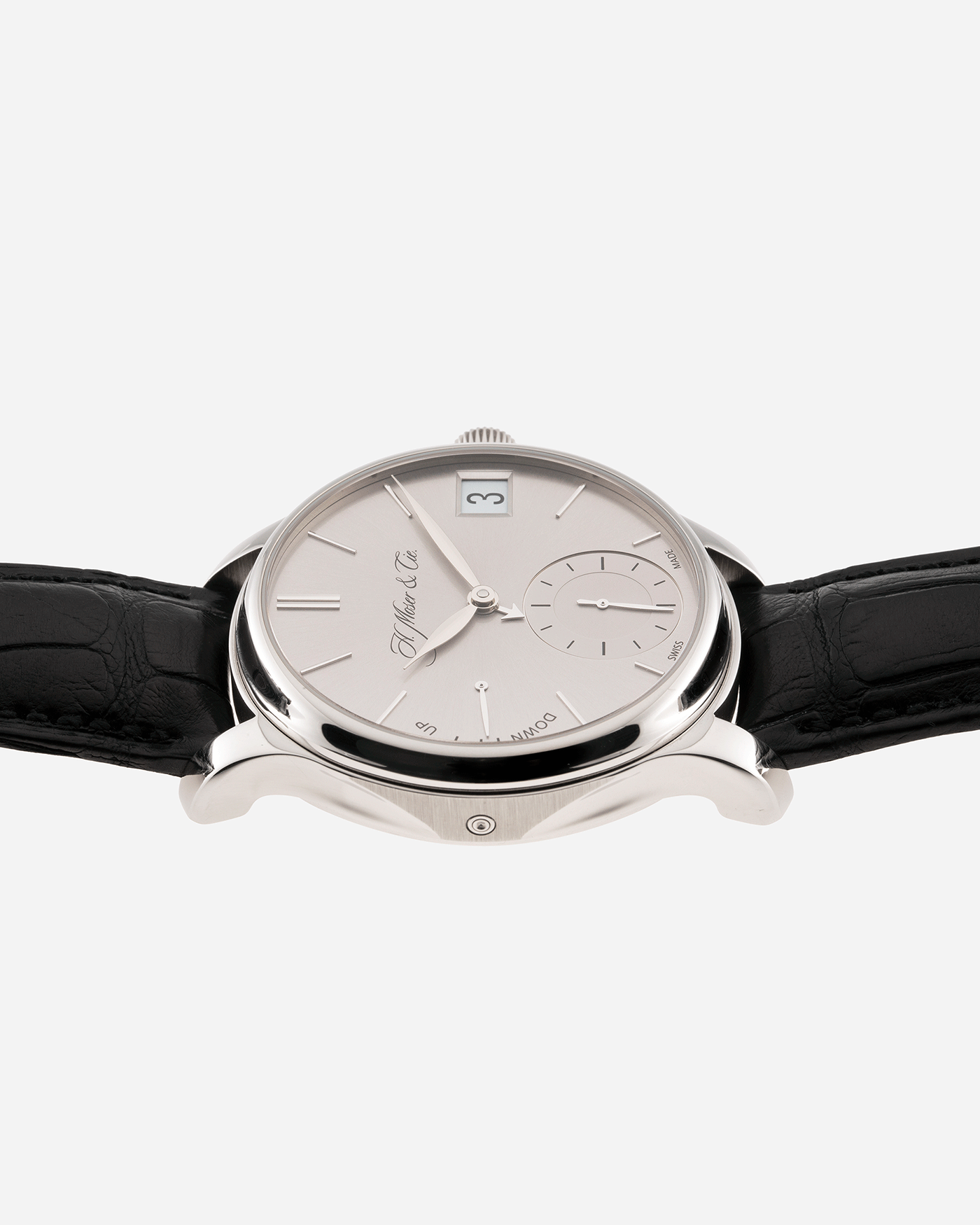 Brand: H.Moser & Cie Year: 2013 Model: Endeavour Perpetual Reference Number: 341.501-002 Material: 18k White Gold Movement: Manually wound Caliber HMC 341.501 Case Diameter: 40.8mm Bracelet/Strap: H. Moser & Cie Black Alligator Leather Strap with matching 18k White Gold Tang Buckle