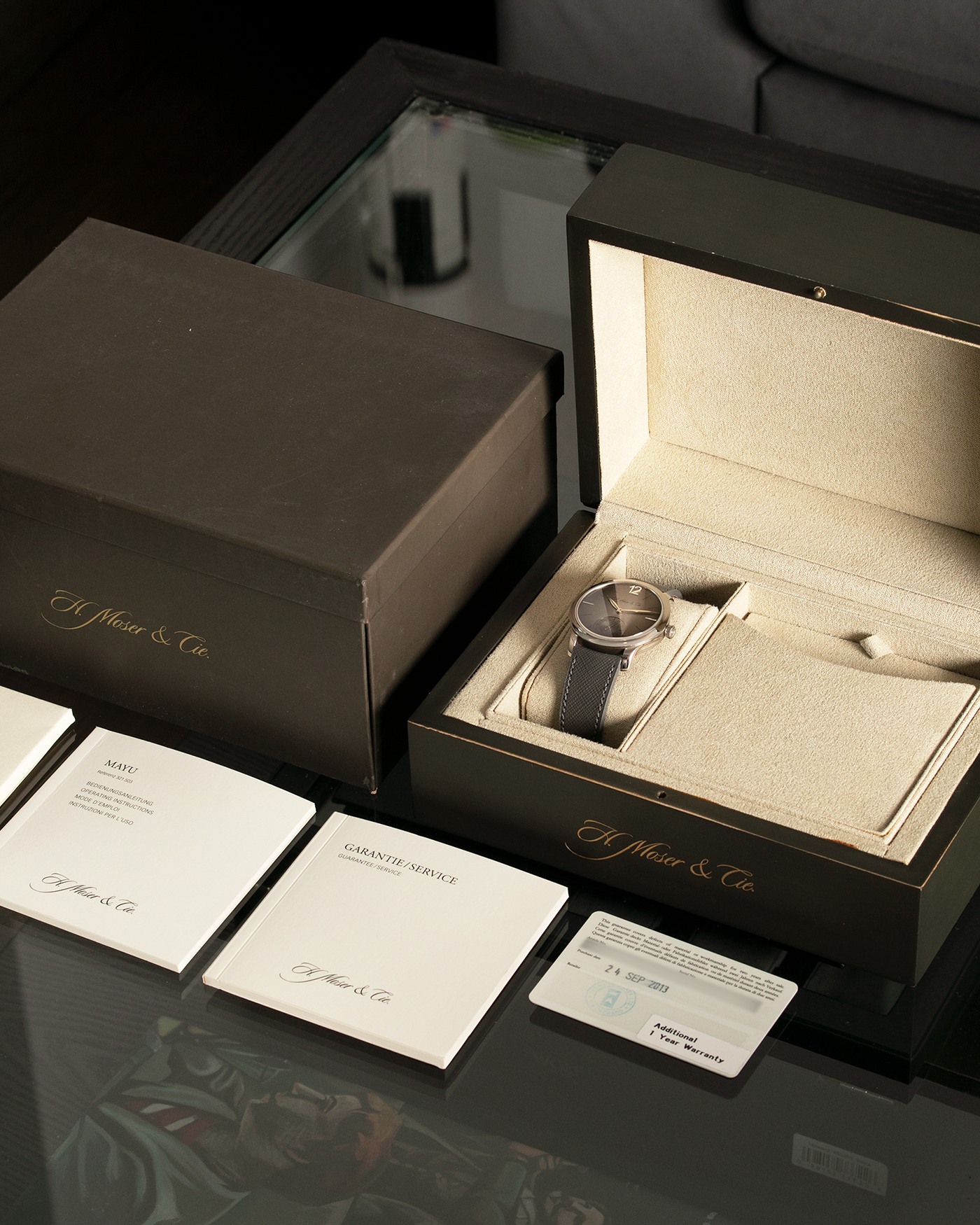Brand: H.Moser & Cie Year: 2013 Model: Mayu  Material: Palladium Movement: Cal. HMC321.503 Case Diameter: 39mm Bracelet/Strap: Molequin Grey Textured Calf and H. Moser & Cie Black Alligator Strap with Palladium Tang Buckle