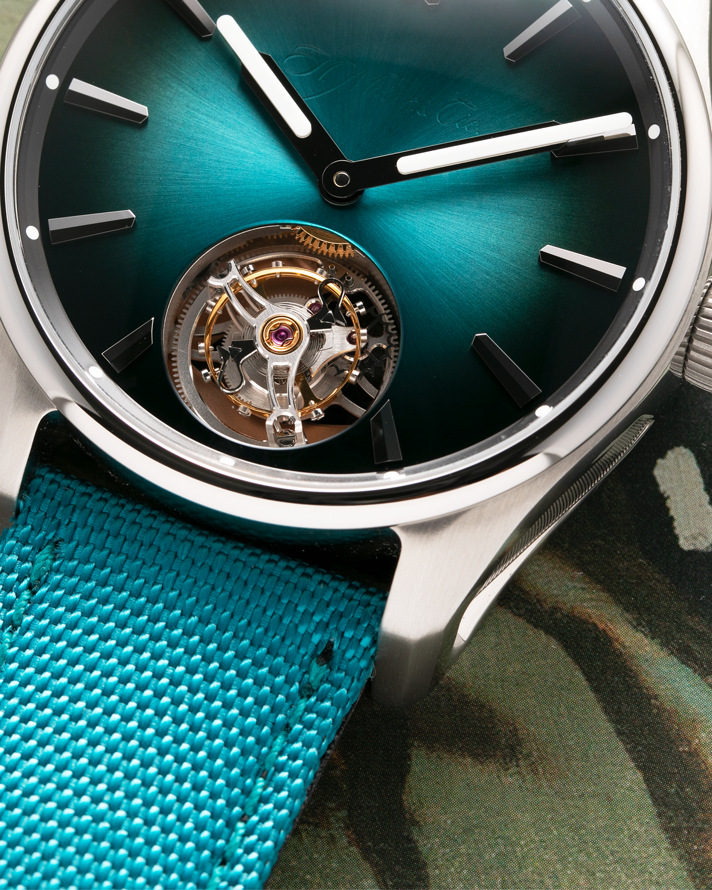 Brand: H.Moser & Cie Year: 2022 Model: Pioneer Tourbillon Material: Stainless Steel Movement: Cal. HMC 804 Case Diameter: 42.8mm Bracelet/Strap: H. Moser & Cie Blue Textile Strap with Stainless Steel Tang Buckle