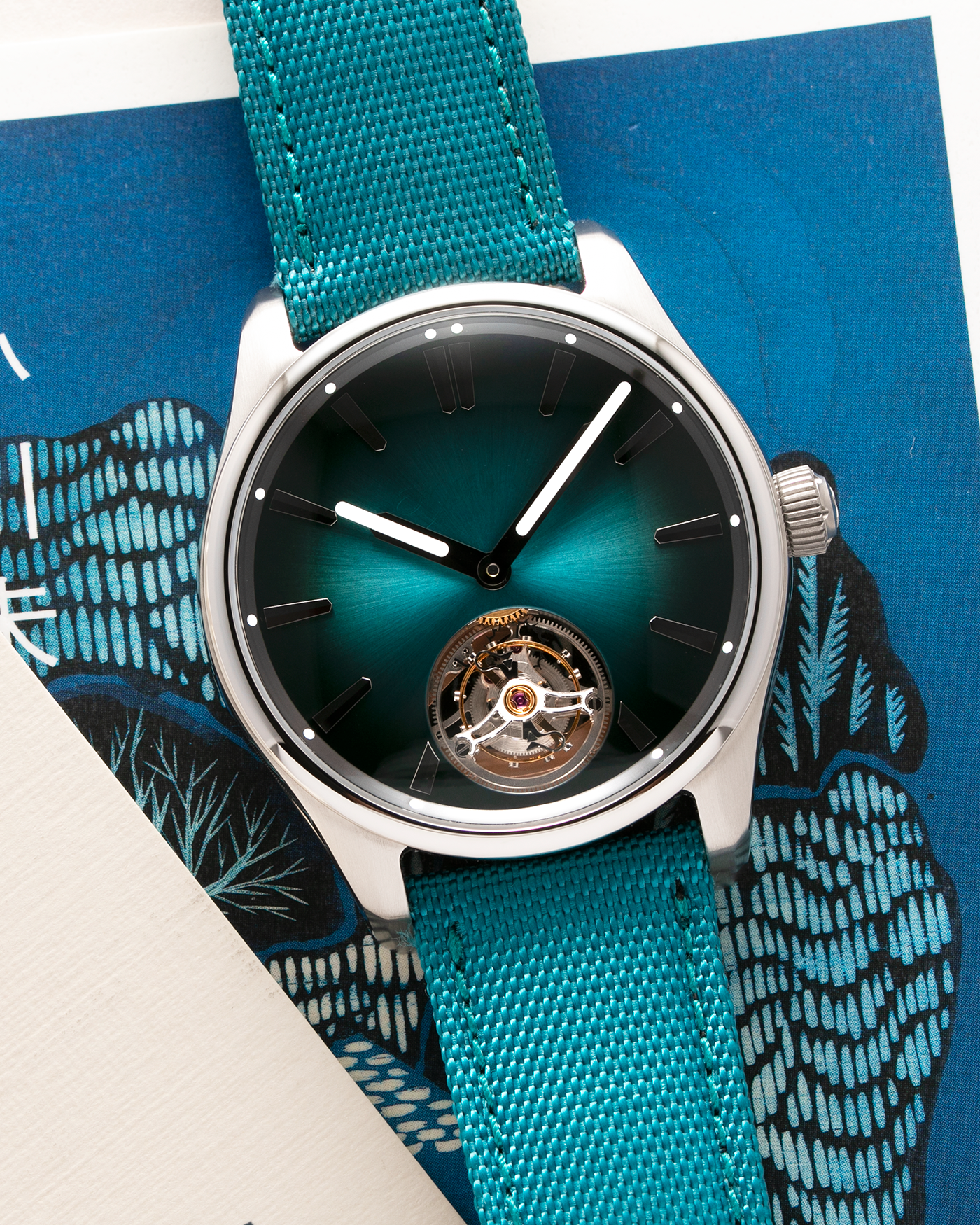 Brand: H.Moser & Cie Year: 2022 Model: Pioneer Tourbillon Material: Stainless Steel Movement: Cal. HMC 804 Case Diameter: 42.8mm Bracelet/Strap: H. Moser & Cie Blue Textile Strap with Stainless Steel Tang Buckle