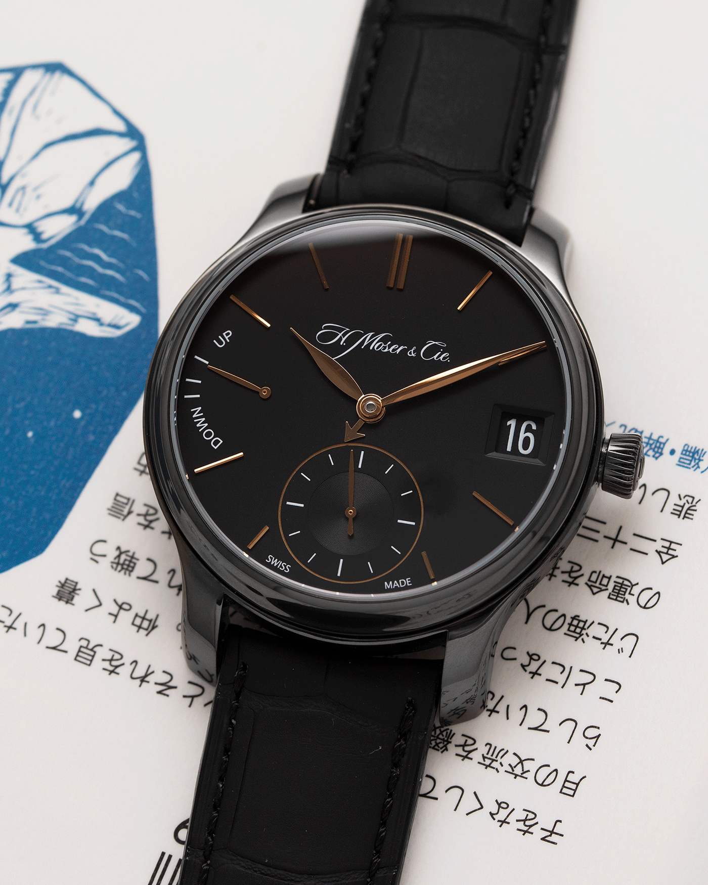 Brand: H.Moser & Cie Year: 2020 Model: Endeavour Perpetual Black Edition Reference Number: 341.050-020 Material: DLC Treated Titanium Movement: Manually wound Caliber HMC 341 Case Diameter: 40.8mm Bracelet/Strap: H. Moser & Cie Black Alligator Leather Strap with matching DLC Coated Titanium Tang Buckle