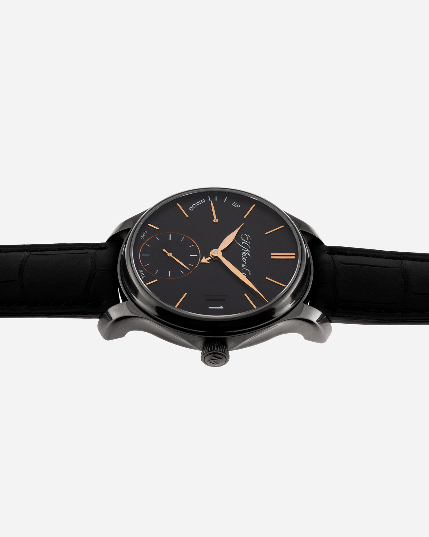 Brand: H.Moser & Cie Year: 2020 Model: Endeavour Perpetual Black Edition Reference Number: 341.050-020 Material: DLC Treated Titanium Movement: Manually wound Caliber HMC 341 Case Diameter: 40.8mm Bracelet/Strap: H. Moser & Cie Black Alligator Leather Strap with matching DLC Coated Titanium Tang Buckle