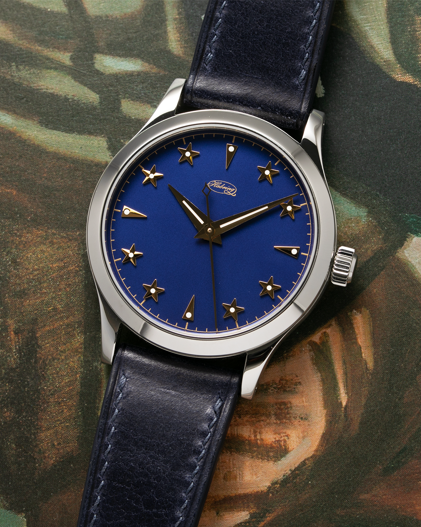 Brand: Habring2 X SJX Model: Erwin Star SJX Year: 2021 Material: Stainless Steel  Movement: Cal. A11s Case Diameter: 38.5mm Lug Width: 20mm Bracelet/Strap: Habring Blue Calf Strap and Stainless Steel Tang Buckle
