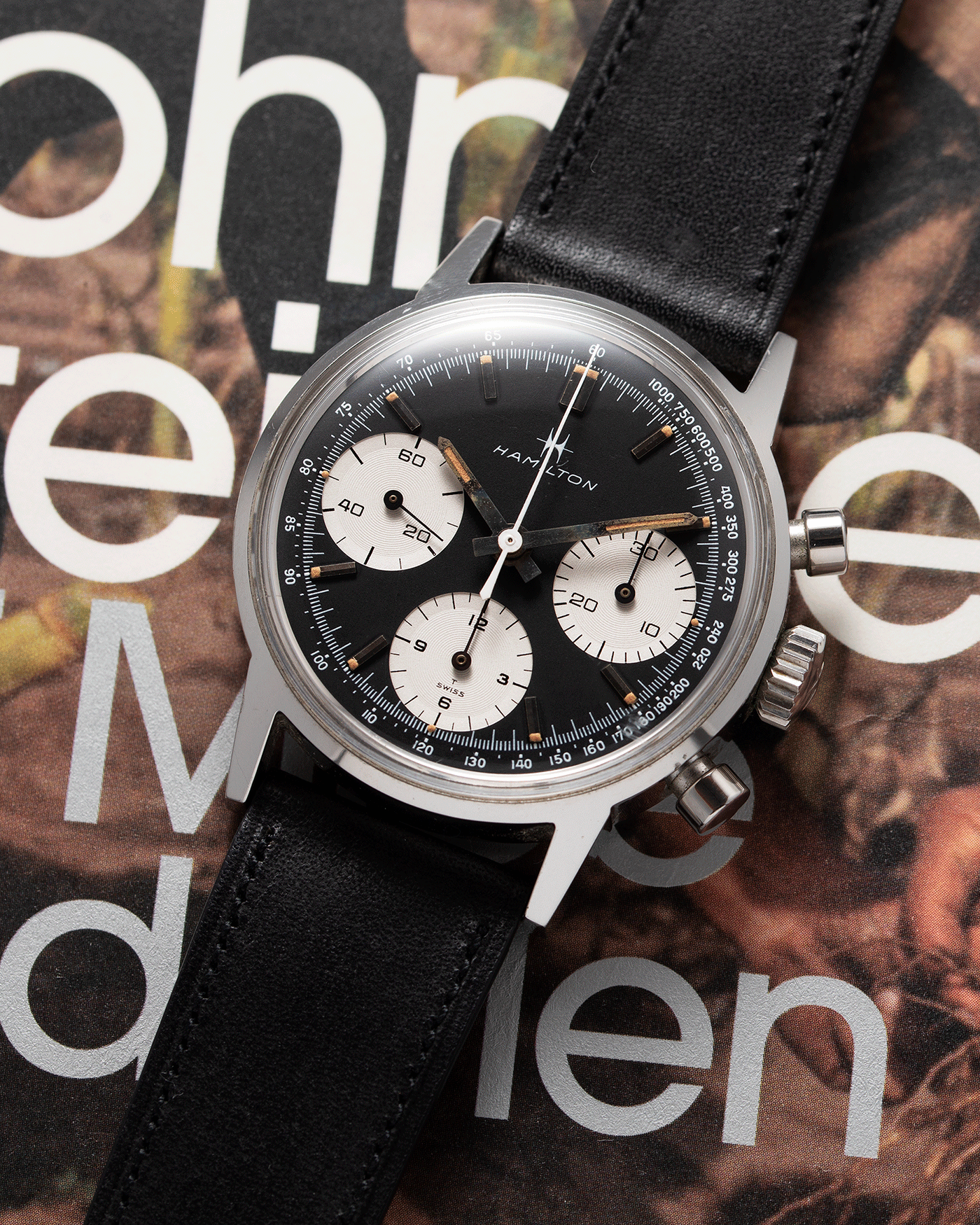 Brand: Hamilton Year: 1960’s Model: Panda Chronograph Material: Stainless Steel Movement: Valjoux 7736 Case Diameter: 36mm Lug Width: 19mm Bracelet/Strap: Nostime Black Calf