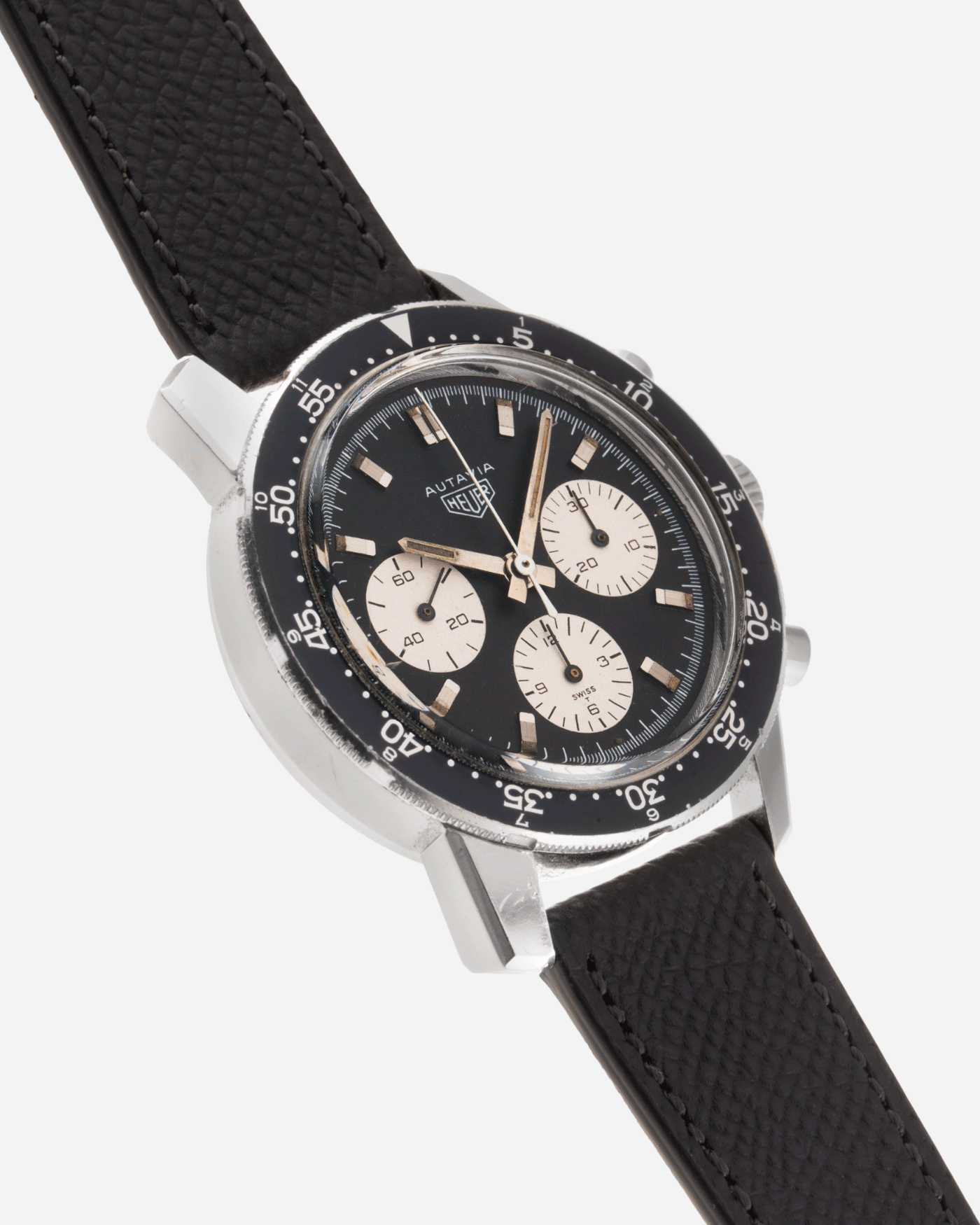 Brand: Heuer Year: 1960’s Model: Autavia Reference Number: 2446C MH (Compressor Case, Minute Hour Bezel) Serial Number: 110XXX Material: Stainless Steel Movement: Valjoux 72 Case Diameter: 40mm Lug Width: 20mm Bracelet/Strap: Molequin Anthracite Grey Textured Calf and Stainless Steel Buckle