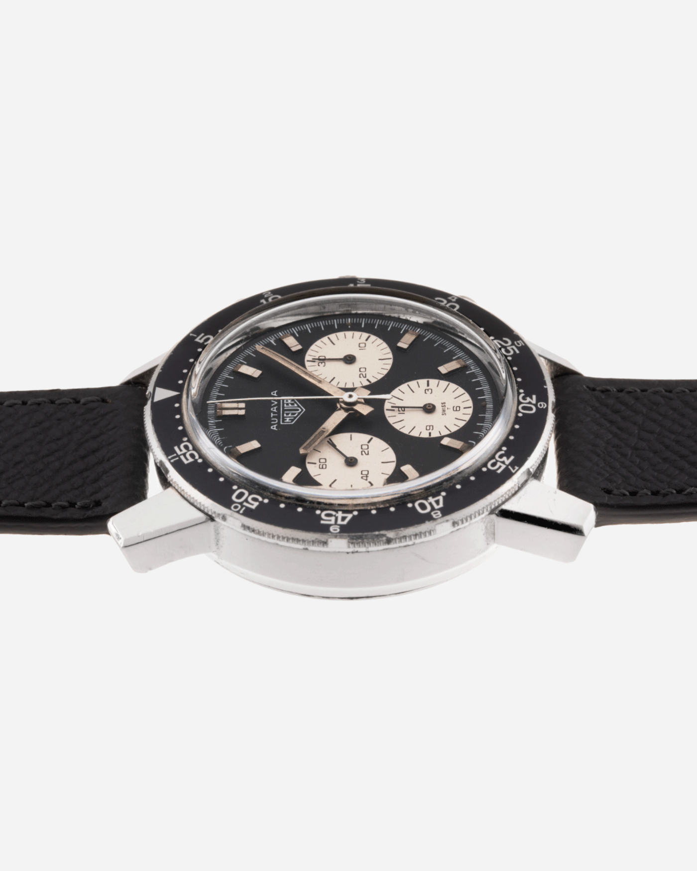 Brand: Heuer Year: 1960’s Model: Autavia Reference Number: 2446C MH (Compressor Case, Minute Hour Bezel) Serial Number: 110XXX Material: Stainless Steel Movement: Valjoux 72 Case Diameter: 40mm Lug Width: 20mm Bracelet/Strap: Molequin Anthracite Grey Textured Calf and Stainless Steel Buckle