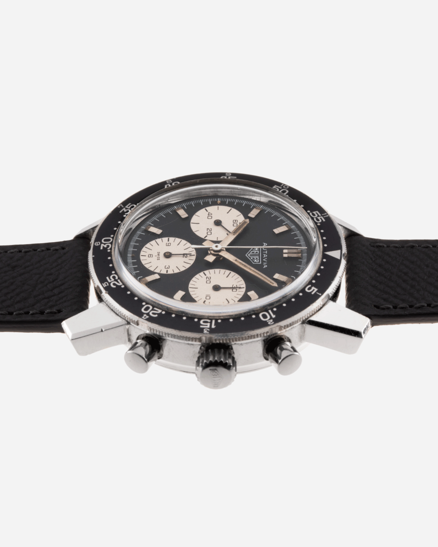 Brand: Heuer Year: 1960’s Model: Autavia Reference Number: 2446C MH (Compressor Case, Minute Hour Bezel) Serial Number: 110XXX Material: Stainless Steel Movement: Valjoux 72 Case Diameter: 40mm Lug Width: 20mm Bracelet/Strap: Molequin Anthracite Grey Textured Calf and Stainless Steel Buckle