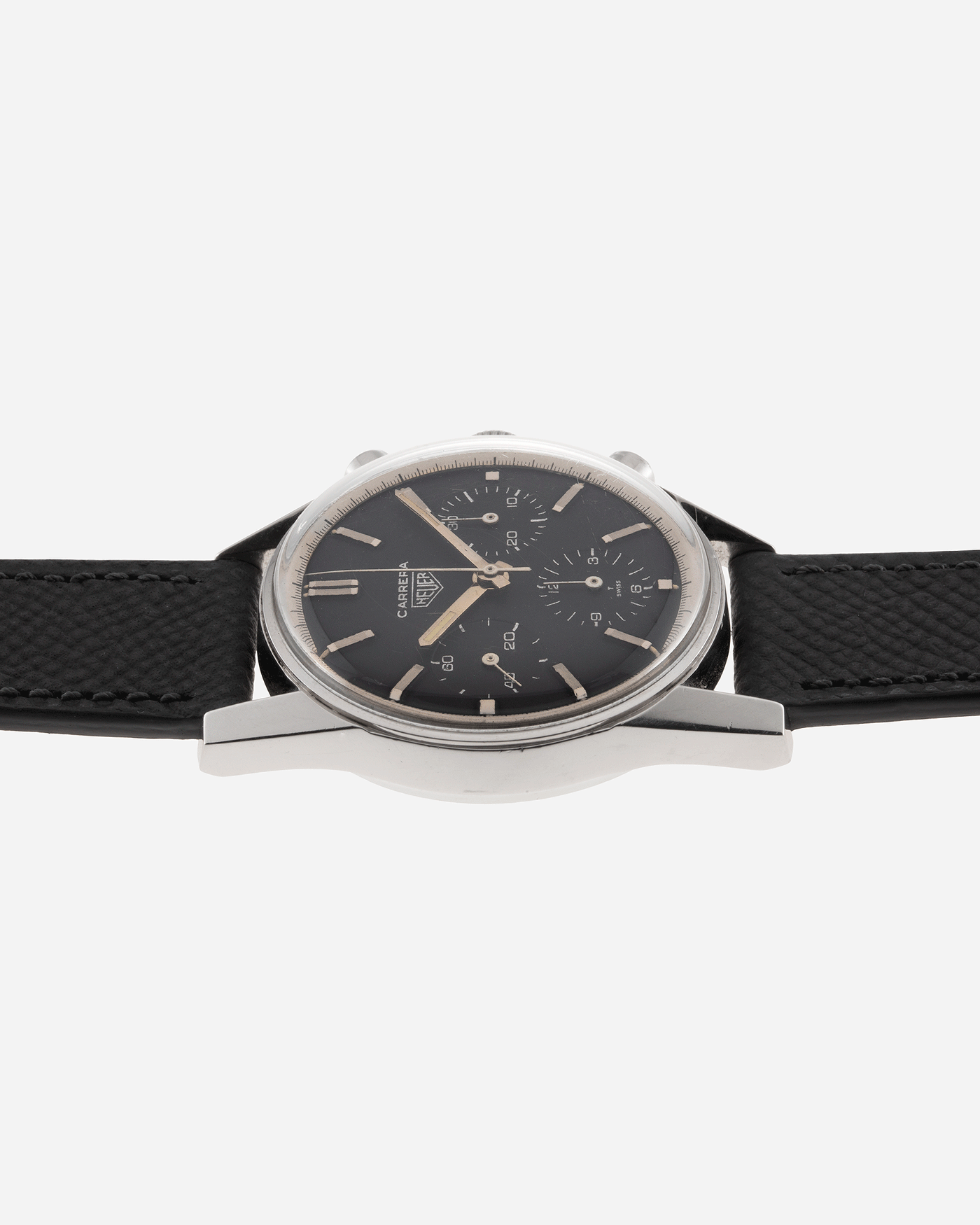 Brand: Heuer Year: 1960’s Model: Carrera Reference Number: 2447N Serial Number: 78XXX Material: Stainless Steel Movement: Valjoux 72 Case Diameter: 36mm Lug Width: 18mm Bracelet/Strap: Molequin Anthracite Textured Calf with Stainless Steel Tang Buckle