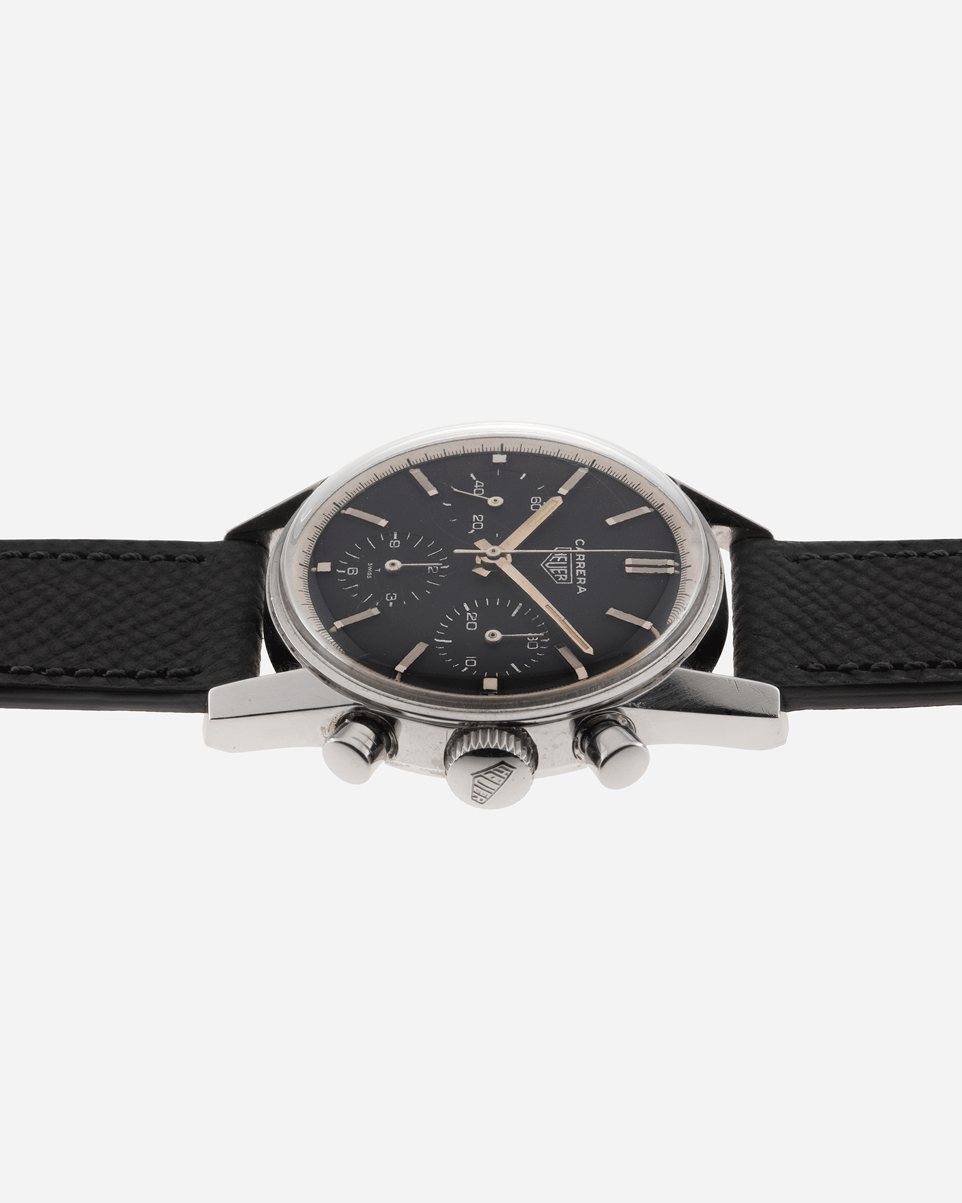 Brand: Heuer Year: 1960’s Model: Carrera Reference Number: 2447N Serial Number: 78XXX Material: Stainless Steel Movement: Valjoux 72 Case Diameter: 36mm Lug Width: 18mm Bracelet/Strap: Molequin Anthracite Textured Calf with Stainless Steel Tang Buckle