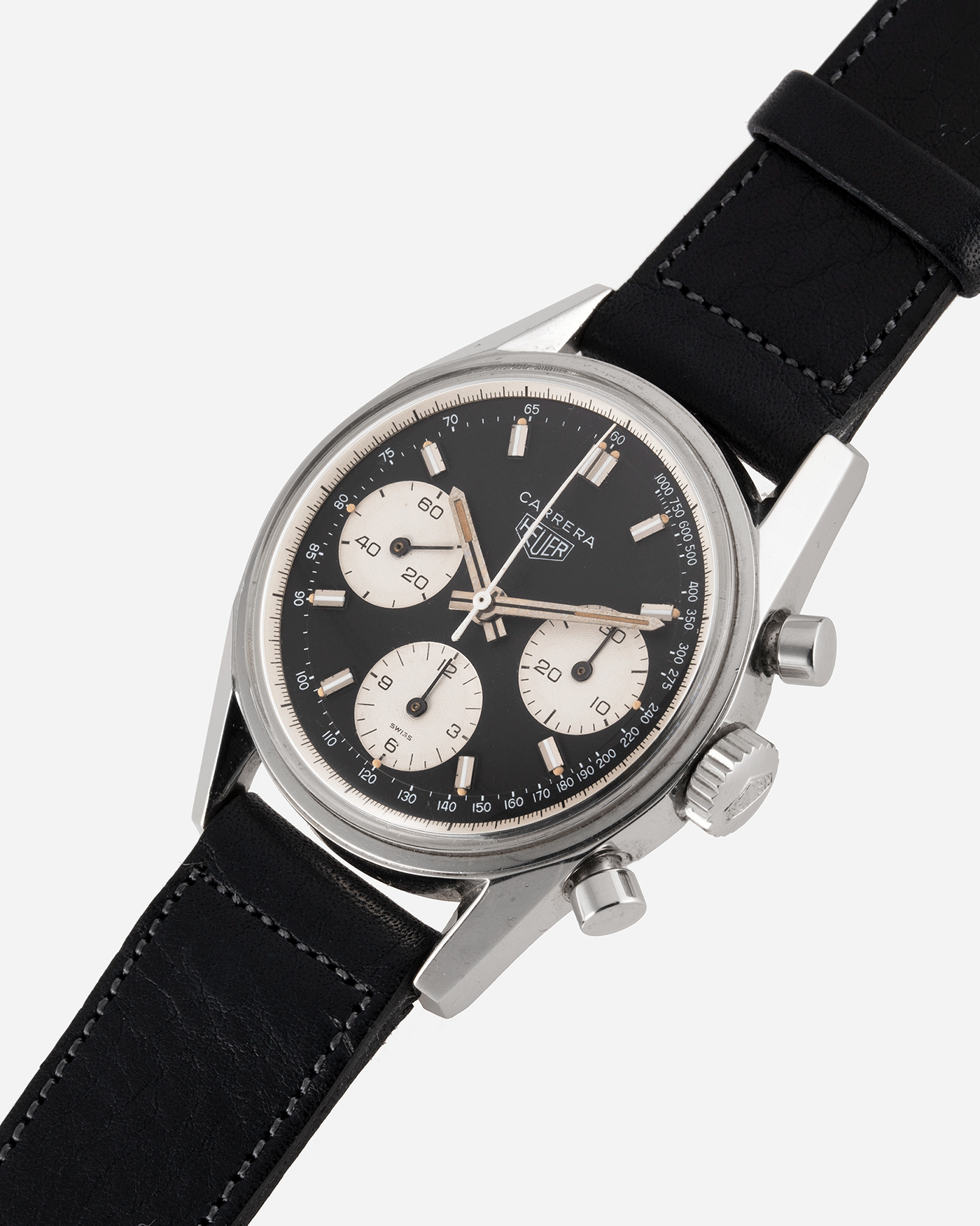 Brand: Heuer Year: 1960’s Model: Carrera Reference Number: 2447NST Material: Stainless Steel Movement: Valjoux 72 Case Diameter: 36mm Lug Width: 18mm Bracelet/Strap: Accurate Form Navy Blue Calf