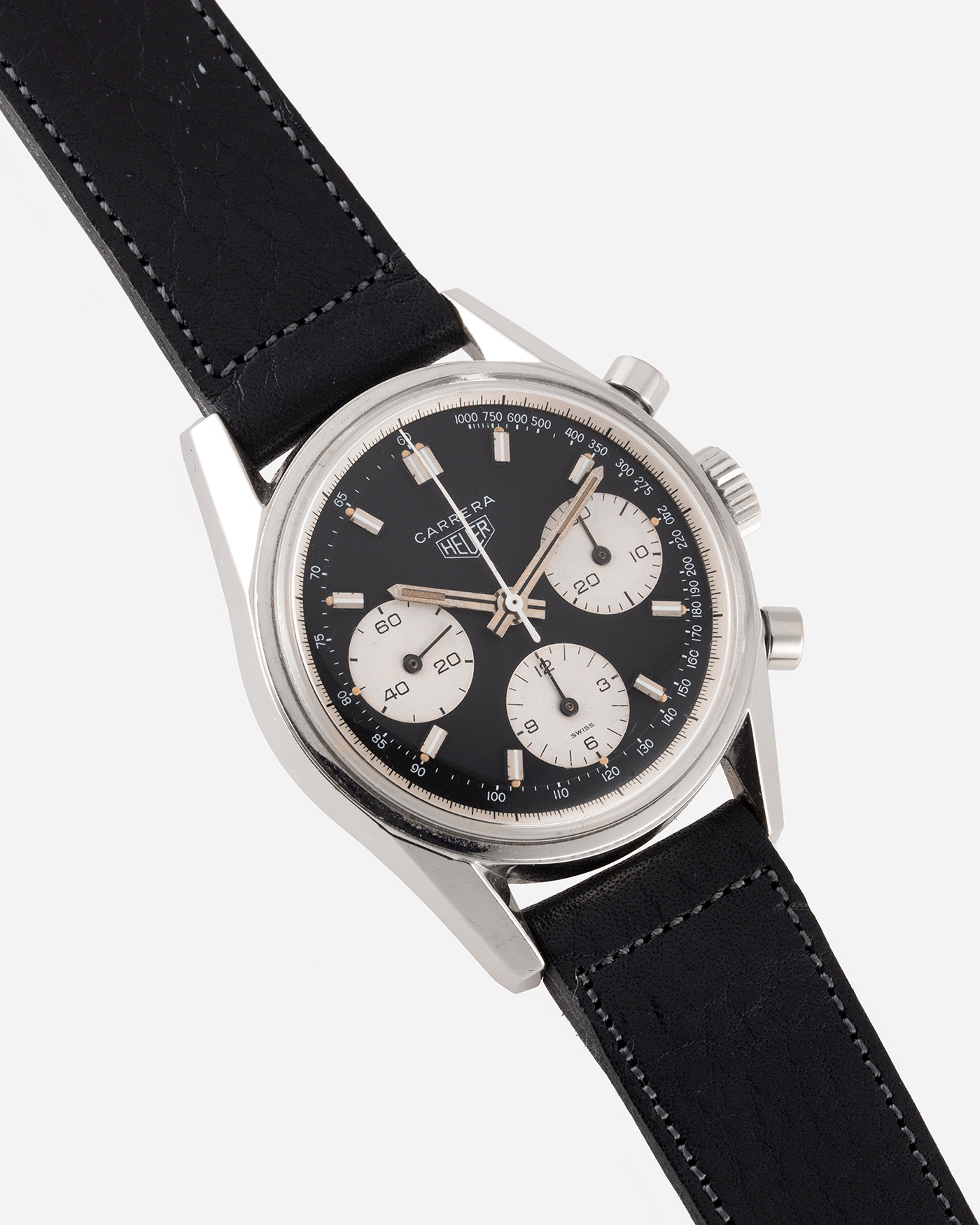 Brand: Heuer Year: 1960’s Model: Carrera Reference Number: 2447NST Material: Stainless Steel Movement: Valjoux 72 Case Diameter: 36mm Lug Width: 18mm Bracelet/Strap: Accurate Form Navy Blue Calf