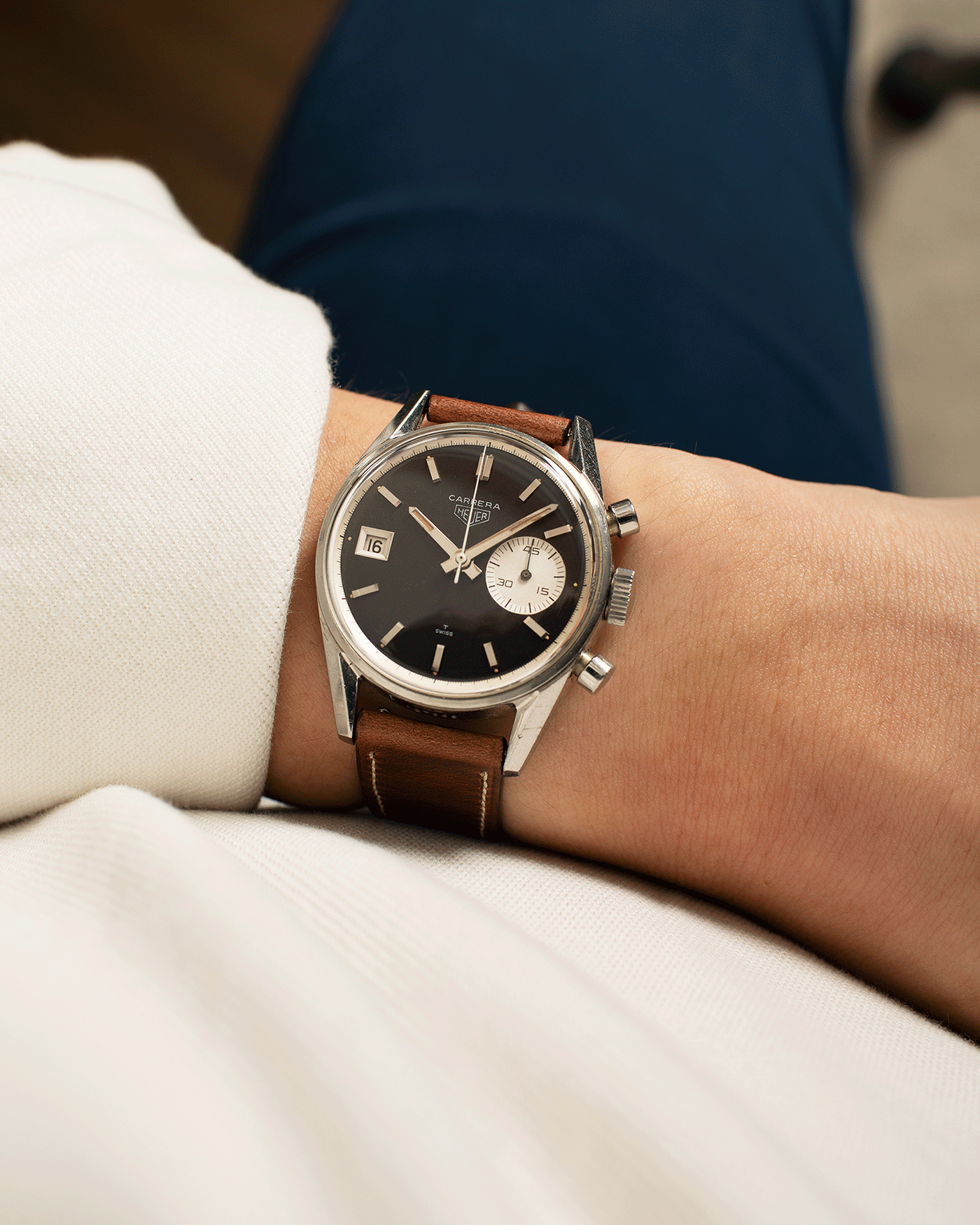 Brand: Heuer Year: 1960’s Model: Carrera Reference Number: Dato 45 Ref. 3147N Serial Number: 127655 Material: Stainless Steel Movement: Landeron 189 Case Diameter: 35mm Lug Width: 18mm Bracelet/Strap: Nostime Tobacco Horween Shell Cordovan