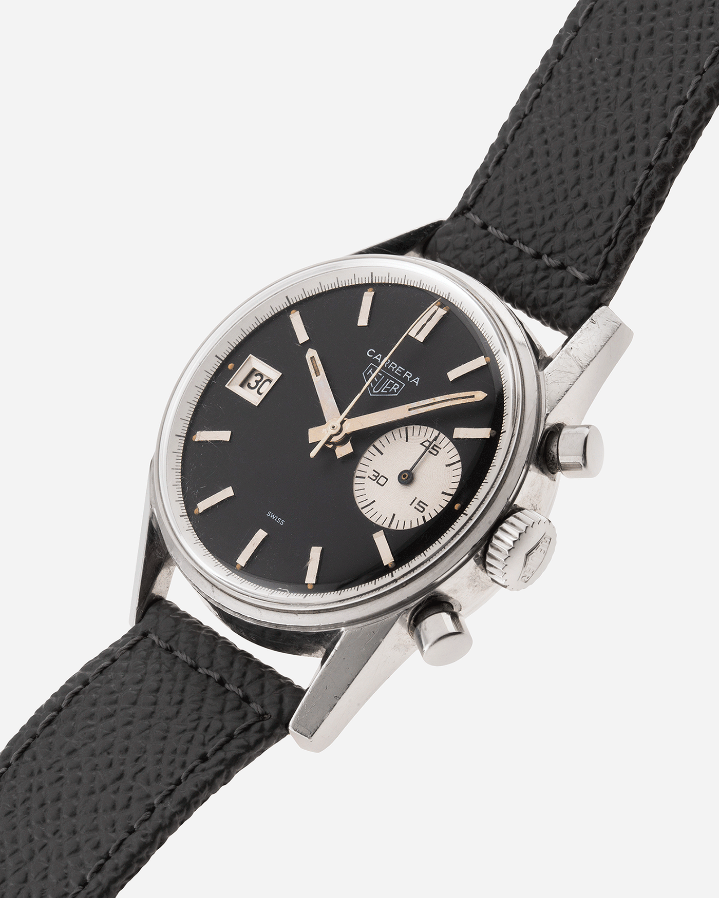 Brand: Heuer Year: 1960’s Model: Carrera Reference Number: Dato 45 Ref. 3147N Material: Stainless Steel Movement: Landeron 189 Case Diameter: 35mm Lug Width: 18mm Bracelet/Strap: A Collected Man Grey Textured Calf Strap