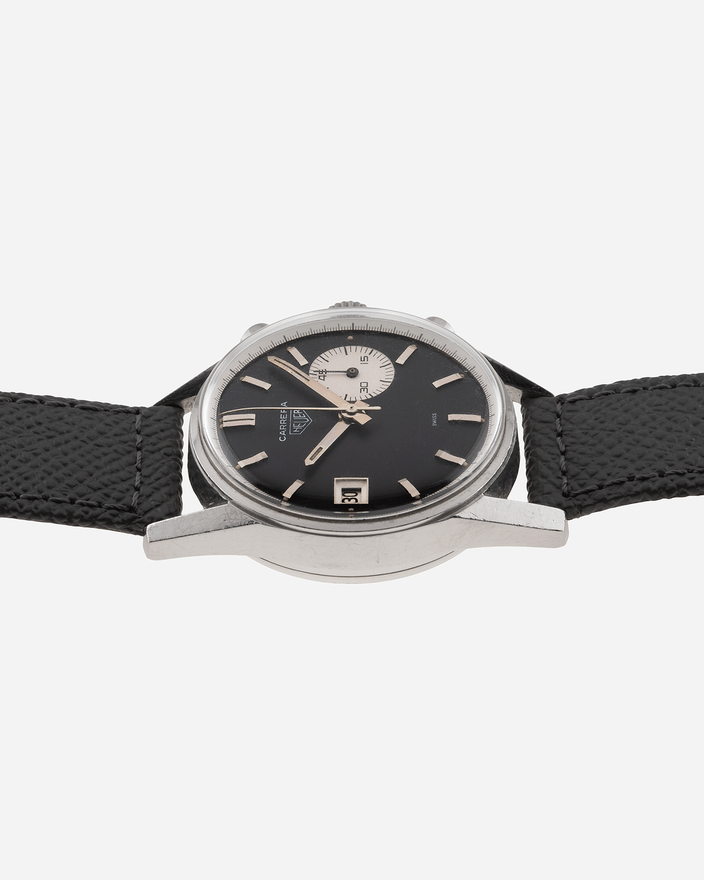 Brand: Heuer Year: 1960’s Model: Carrera Reference Number: Dato 45 Ref. 3147N Material: Stainless Steel Movement: Landeron 189 Case Diameter: 35mm Lug Width: 18mm Bracelet/Strap: A Collected Man Grey Textured Calf Strap