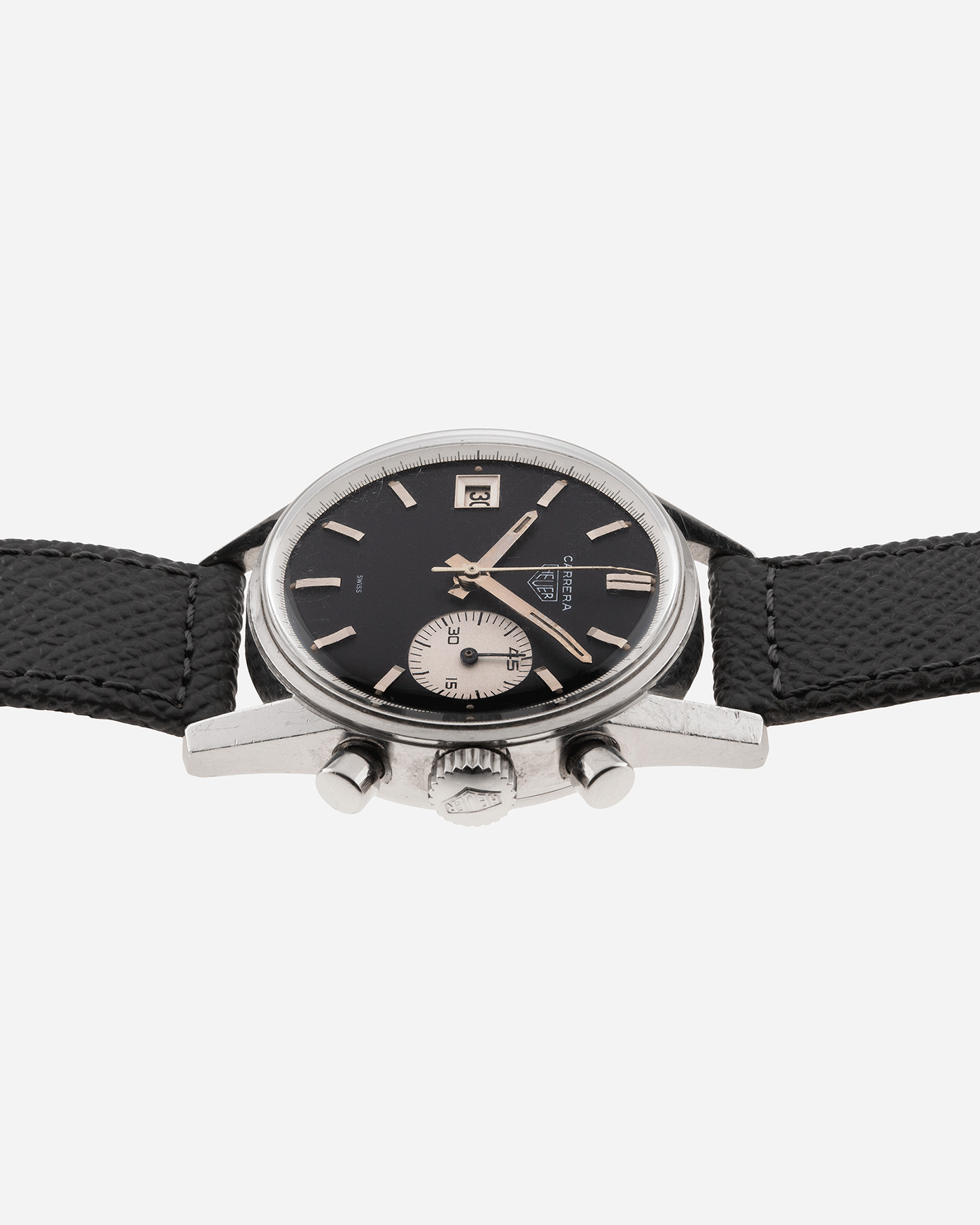Brand: Heuer Year: 1960’s Model: Carrera Reference Number: Dato 45 Ref. 3147N Material: Stainless Steel Movement: Landeron 189 Case Diameter: 35mm Lug Width: 18mm Bracelet/Strap: A Collected Man Grey Textured Calf Strap