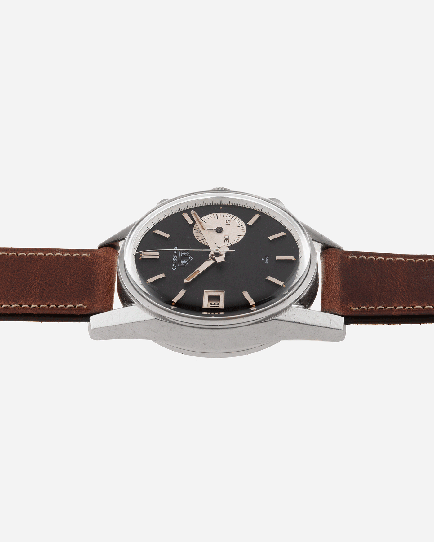Brand: Heuer Year: 1960’s Model: Carrera Reference Number: Dato 45 Ref. 3147N Serial Number: 127655 Material: Stainless Steel Movement: Landeron 189 Case Diameter: 35mm Lug Width: 18mm Bracelet/Strap: Nostime Tobacco Horween Shell Cordovan