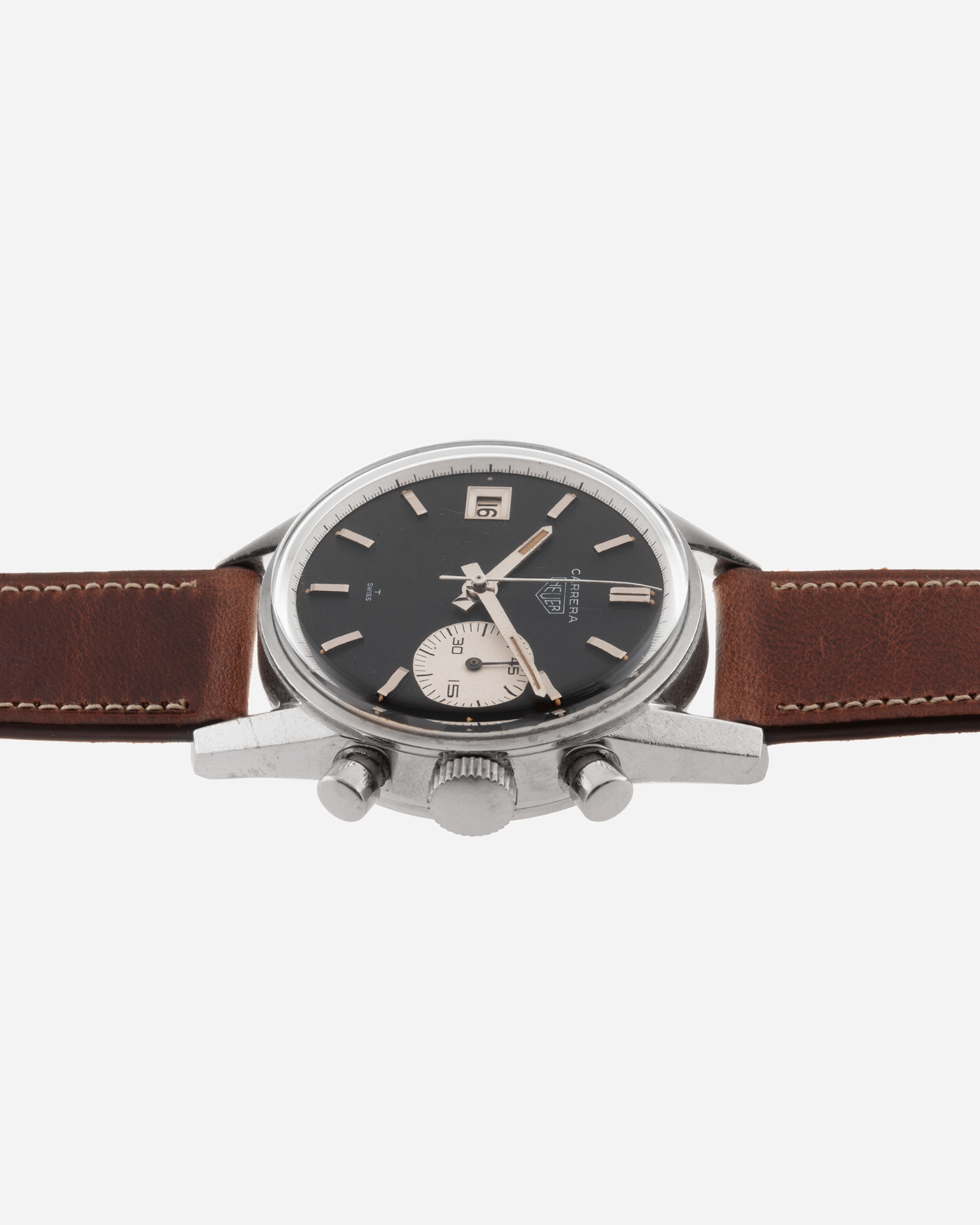 Brand: Heuer Year: 1960’s Model: Carrera Reference Number: Dato 45 Ref. 3147N Serial Number: 127655 Material: Stainless Steel Movement: Landeron 189 Case Diameter: 35mm Lug Width: 18mm Bracelet/Strap: Nostime Tobacco Horween Shell Cordovan