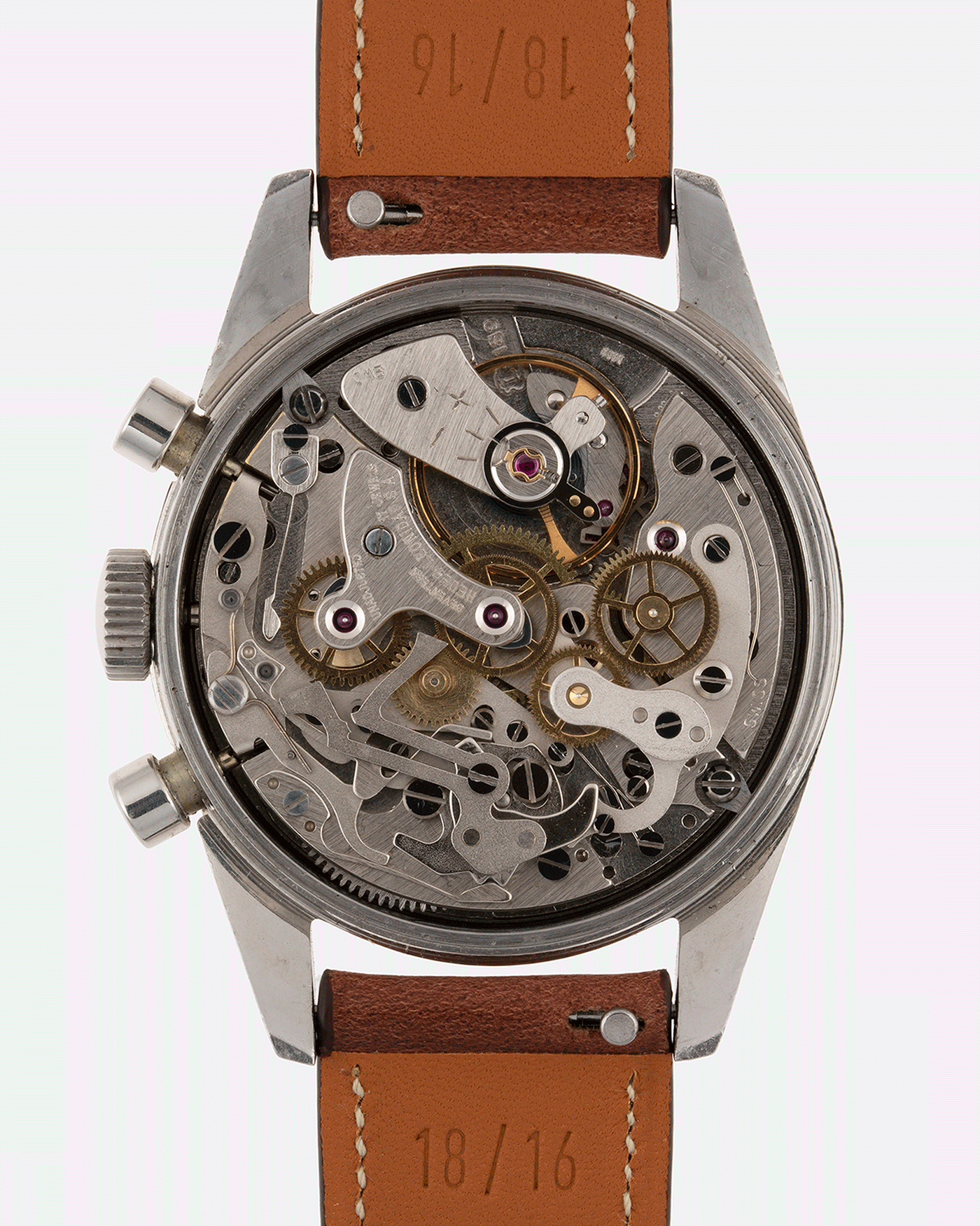 Brand: Heuer Year: 1960’s Model: Carrera Reference Number: Dato 45 Ref. 3147N Serial Number: 127655 Material: Stainless Steel Movement: Landeron 189 Case Diameter: 35mm Lug Width: 18mm Bracelet/Strap: Nostime Tobacco Horween Shell Cordovan